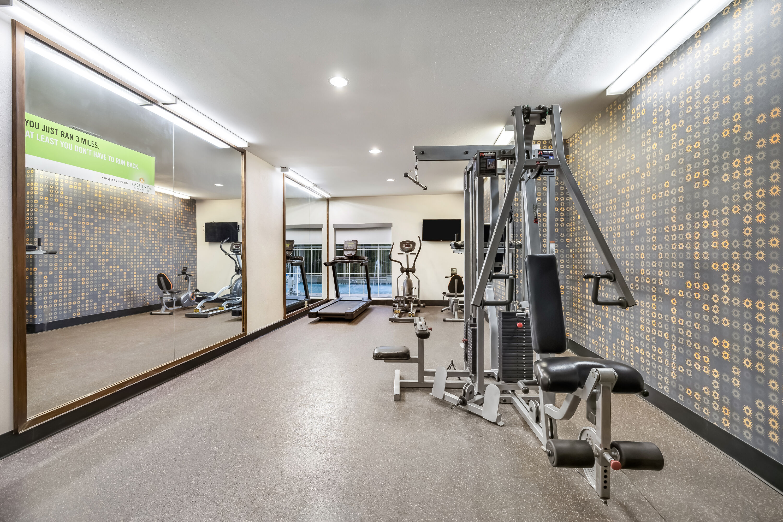 Fitness room at La Quinta Inn & Suites by Wyndham Alvin in Alvin, Texas