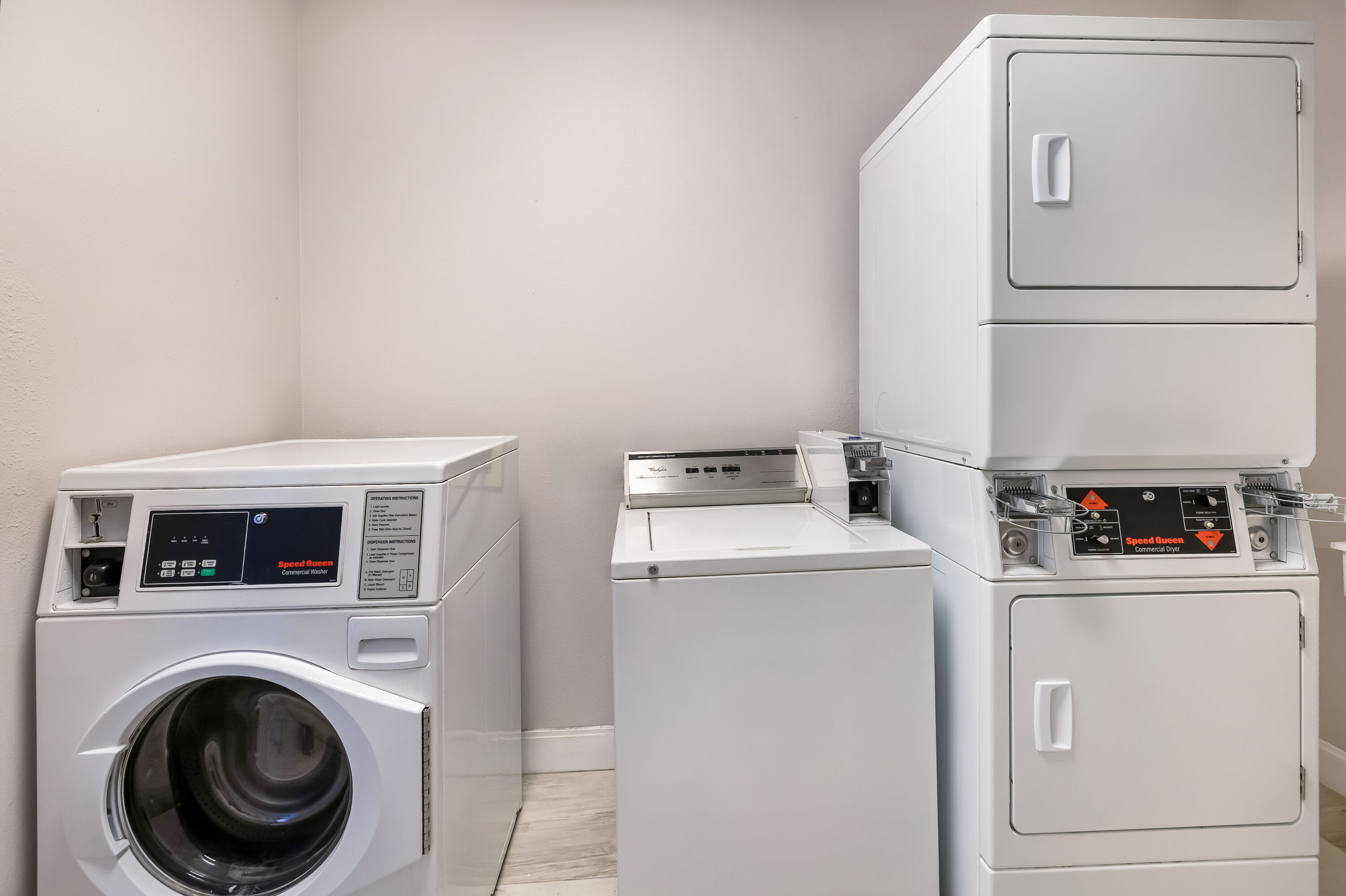 Laundry facilities at La Quinta Inn & Suites by Wyndham Alvin in Alvin, Texas