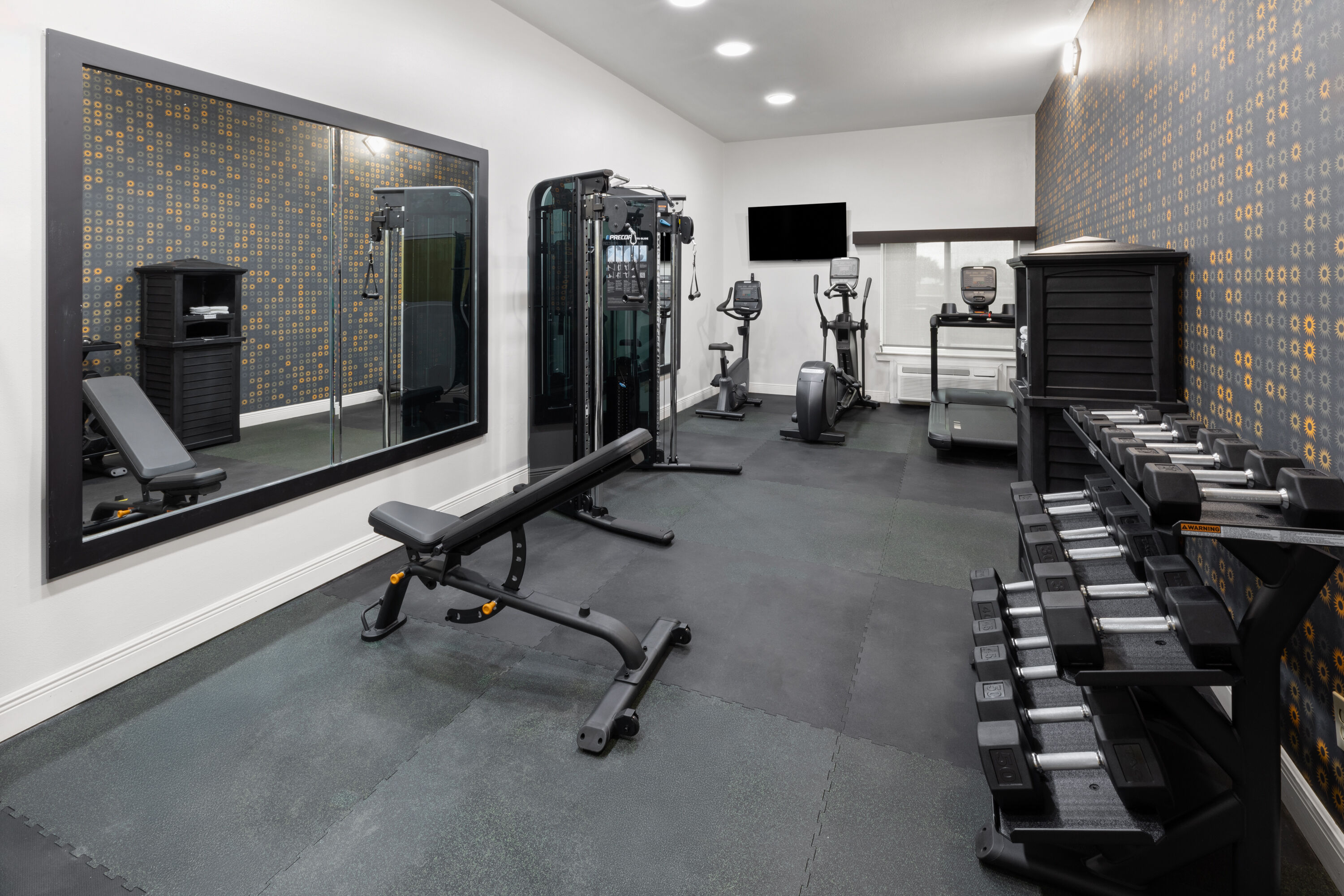 Fitness room at La Quinta Inn & Suites by Wyndham Angleton in Angleton, Texas