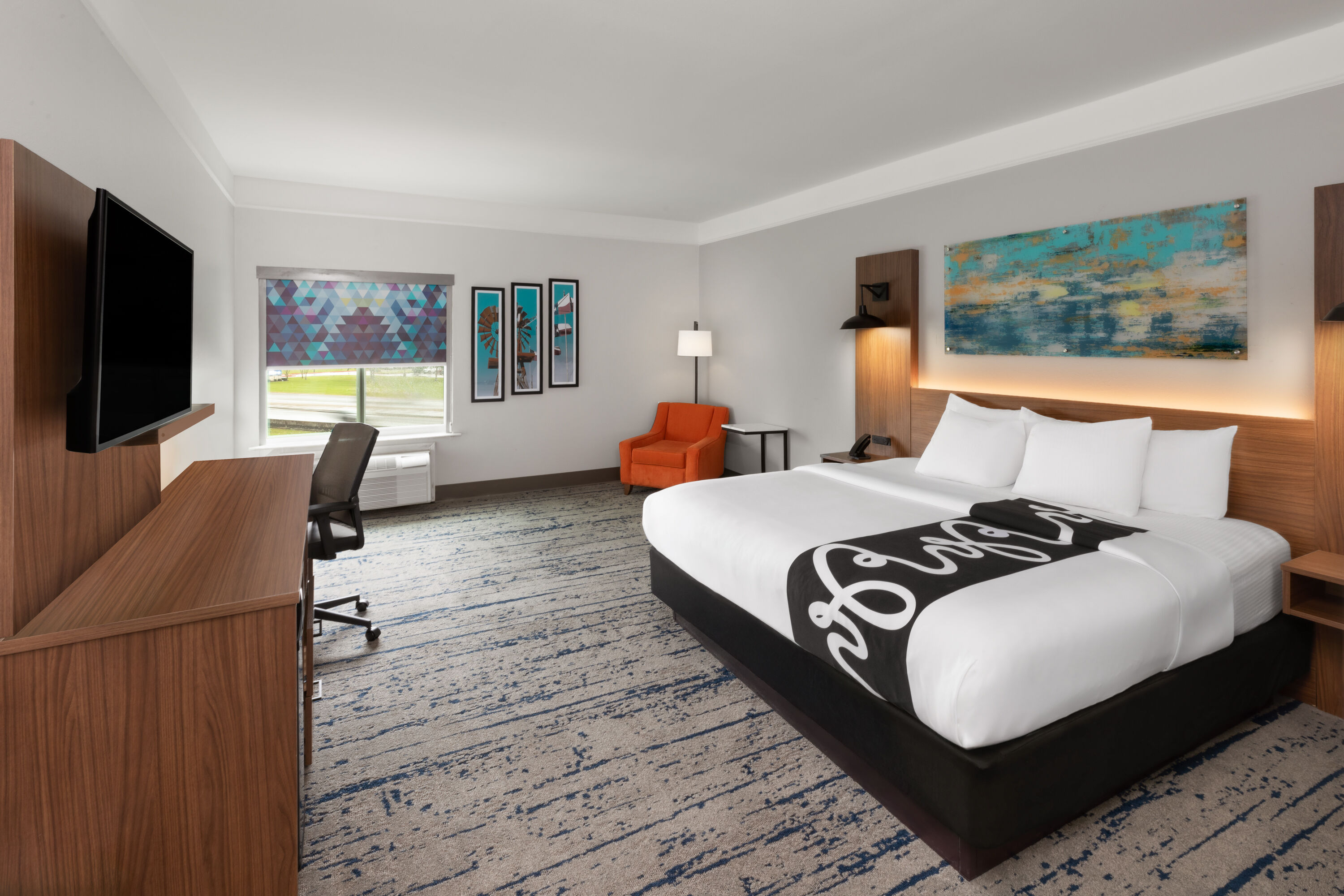 Guest room at the La Quinta Inn & Suites by Wyndham Angleton in Angleton, Texas