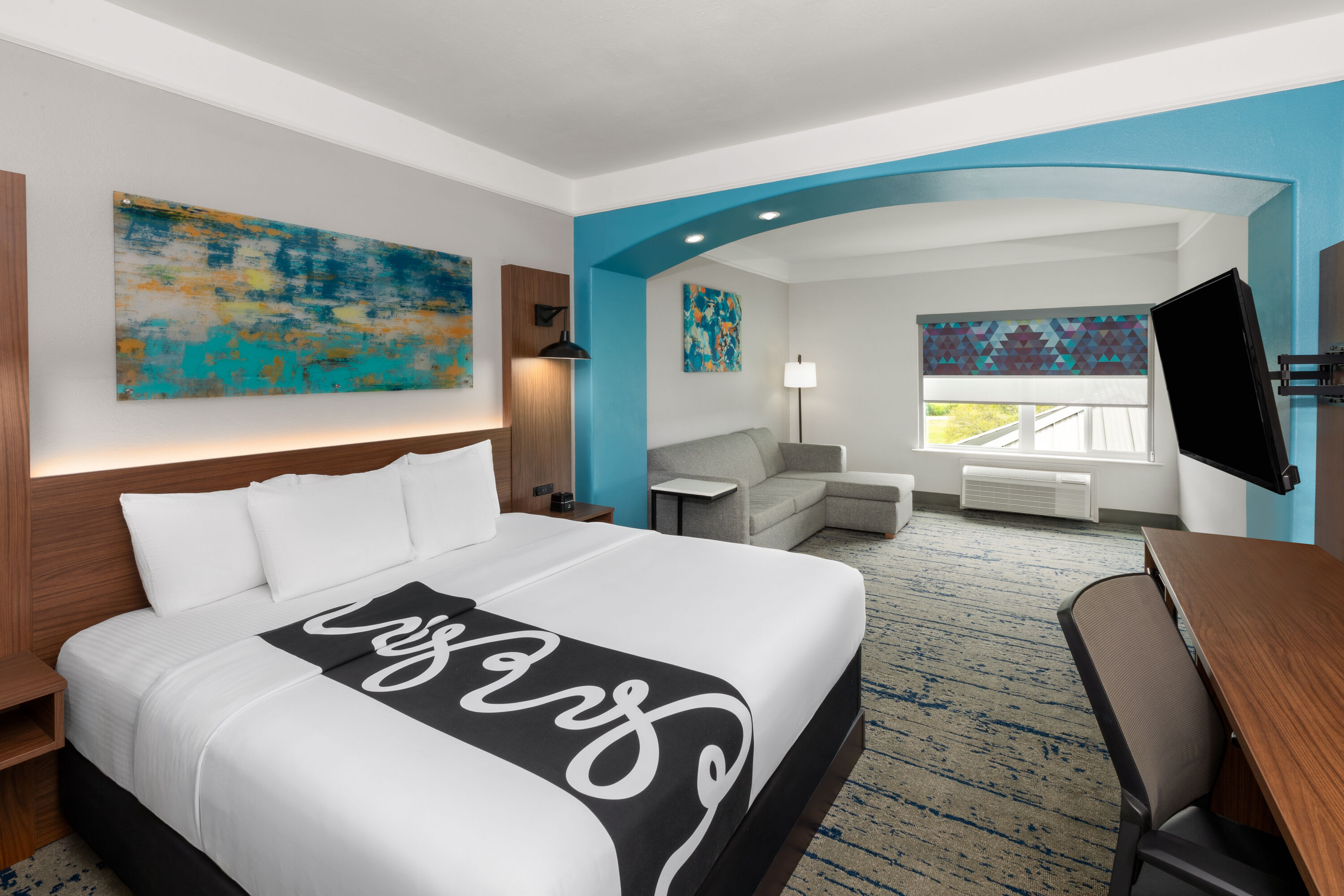 Guest room at the La Quinta Inn & Suites by Wyndham Angleton in Angleton, Texas