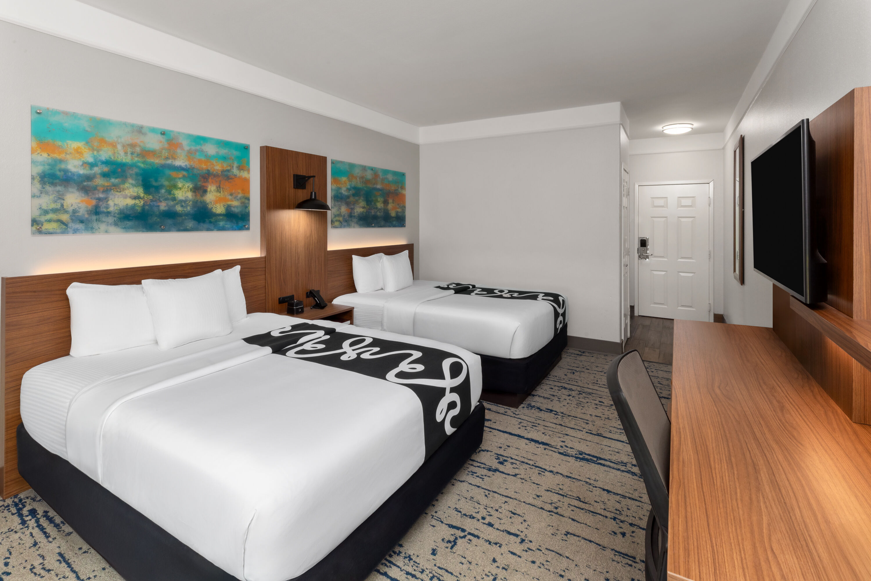 Guest room at the La Quinta Inn & Suites by Wyndham Angleton in Angleton, Texas