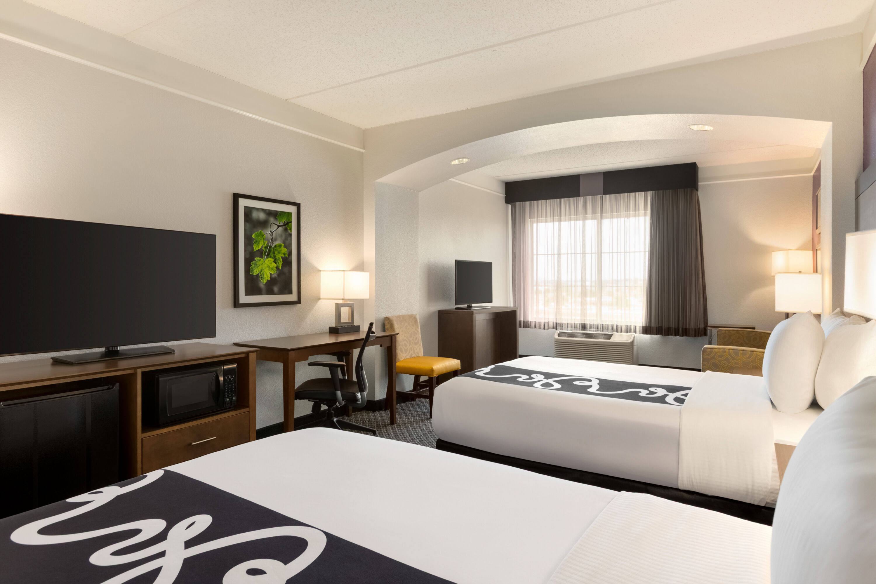 Guest room at the La Quinta Inn & Suites by Wyndham Arlington North 6 Flags Dr in Arlington, Texas