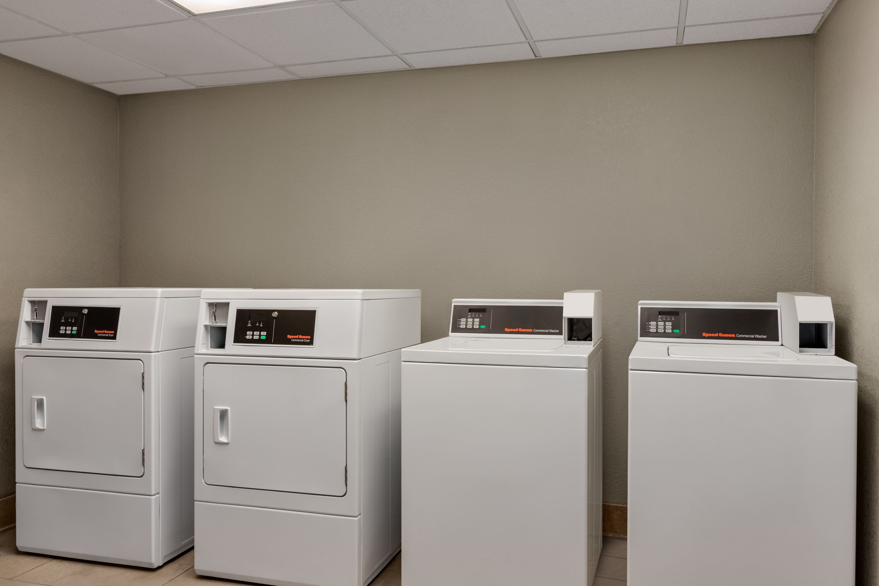 Laundry facilities at La Quinta Inn & Suites by Wyndham Arlington North 6 Flags Dr in Arlington, Texas