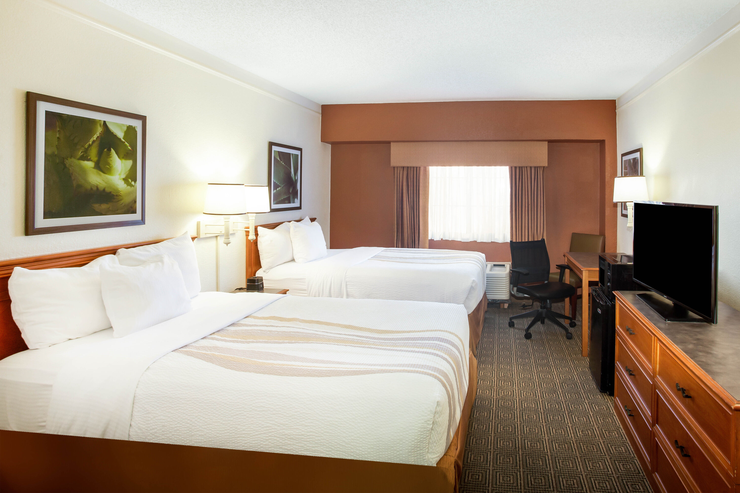 Guest room at the La Quinta Inn by Wyndham Austin Capitol / Downtown in Austin, Texas
