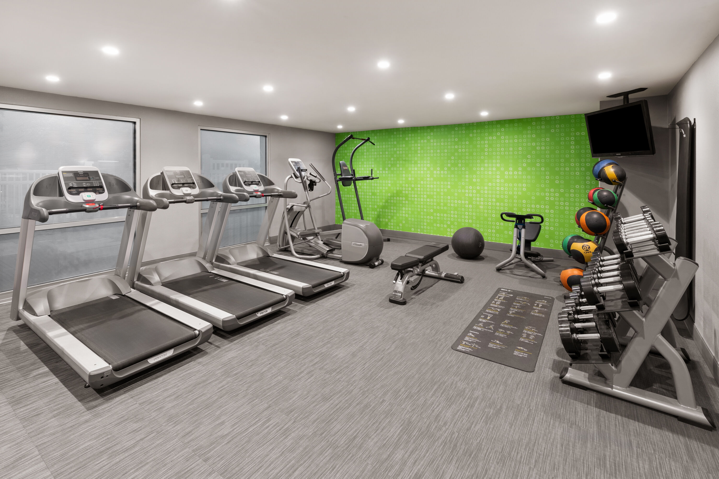 Fitness room at La Quinta Inn & Suites by Wyndham Austin Round Rock in Austin, Texas