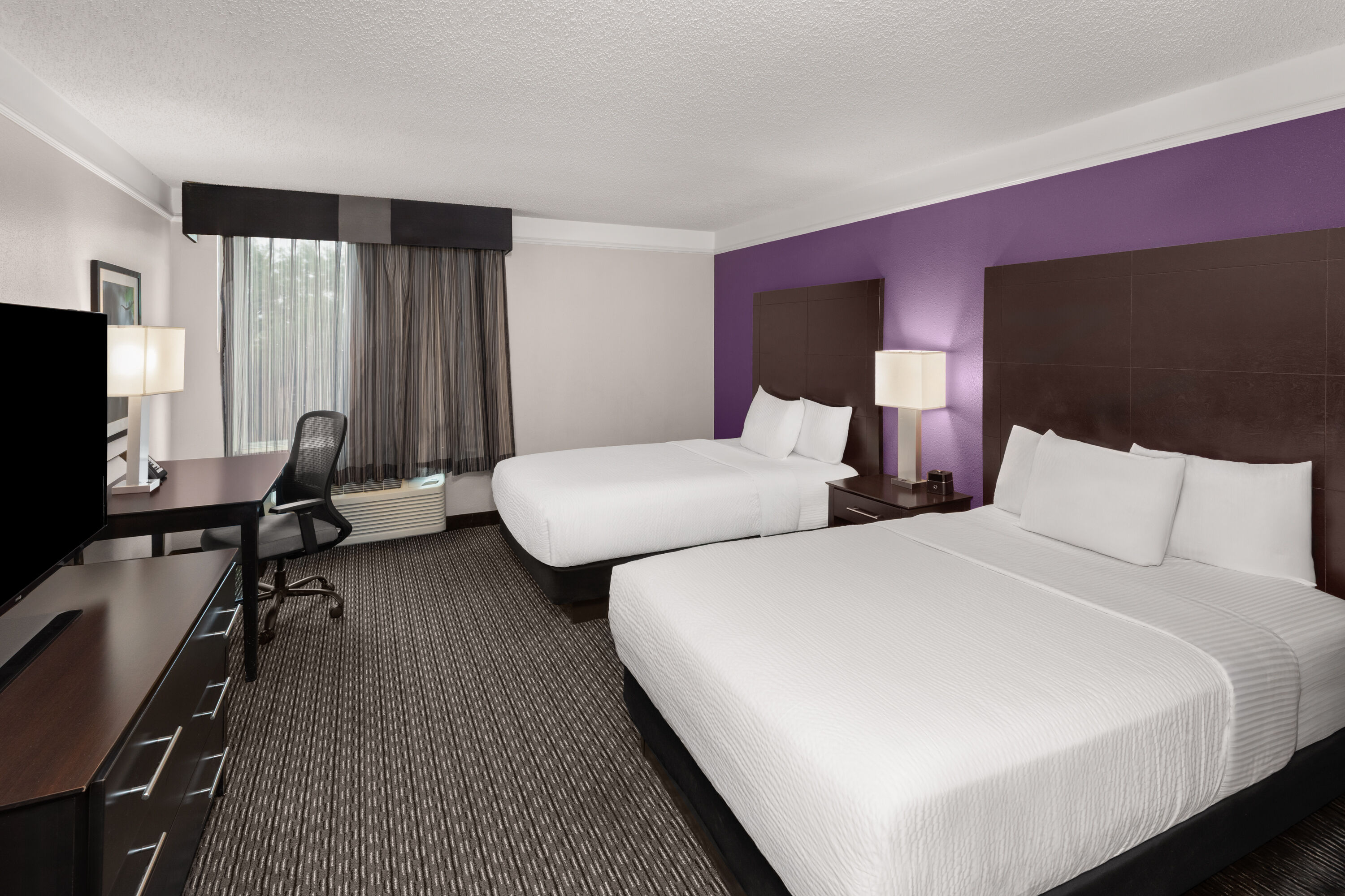 Guest room at the La Quinta Inn & Suites by Wyndham Austin Round Rock in Austin, Texas