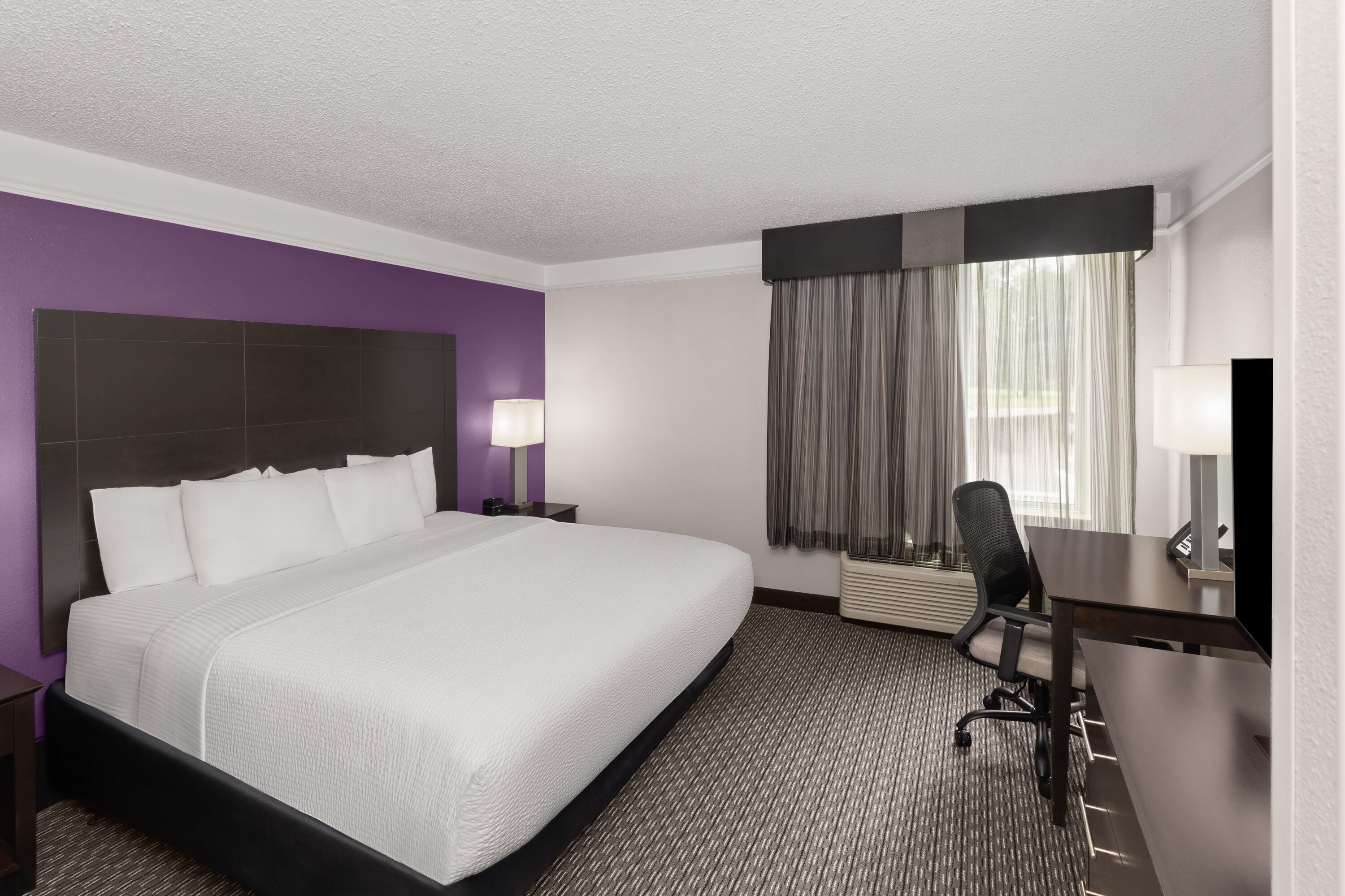 Guest room at the La Quinta Inn & Suites by Wyndham Austin Round Rock in Austin, Texas