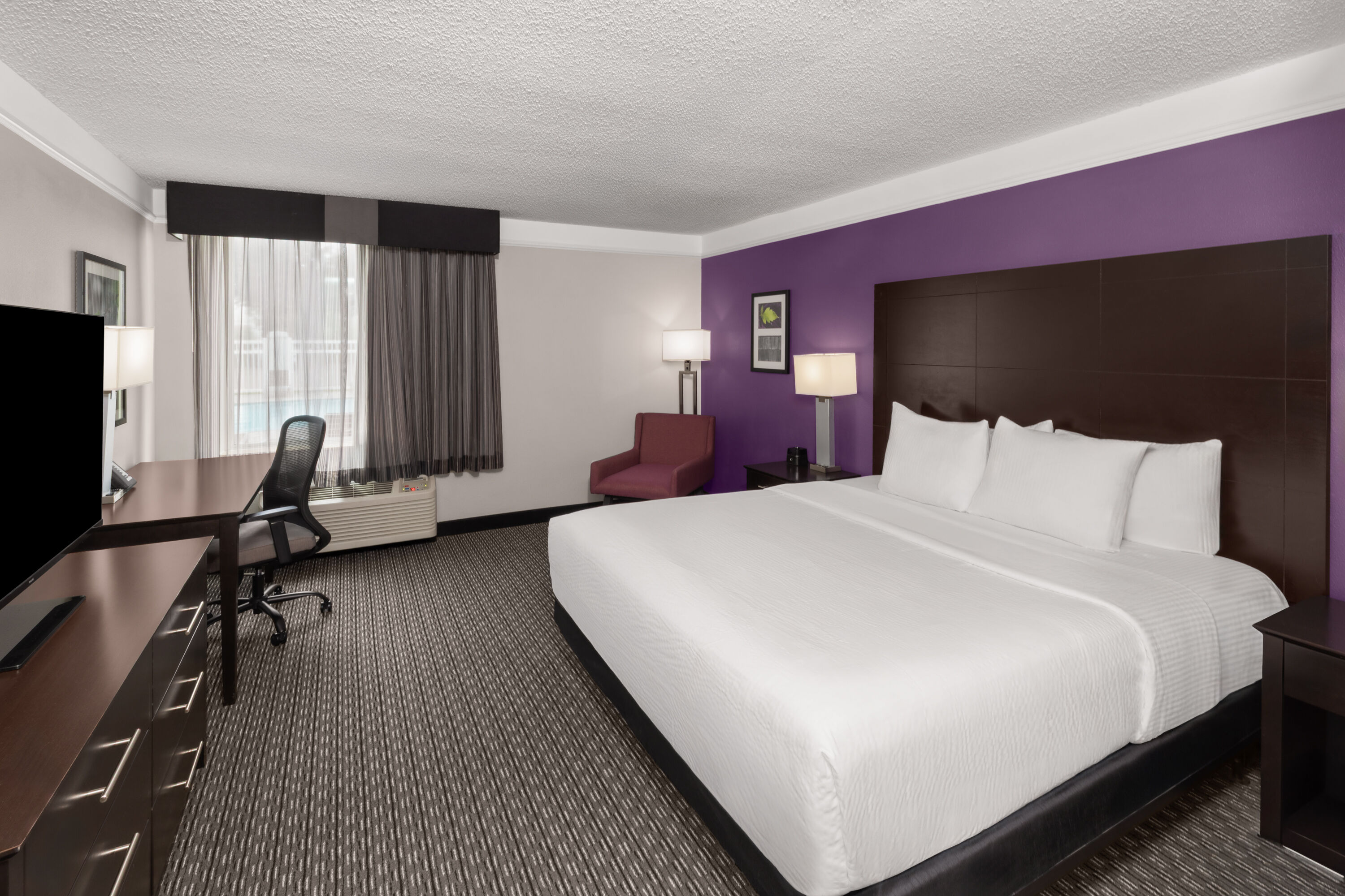 Guest room at the La Quinta Inn & Suites by Wyndham Austin Round Rock in Austin, Texas