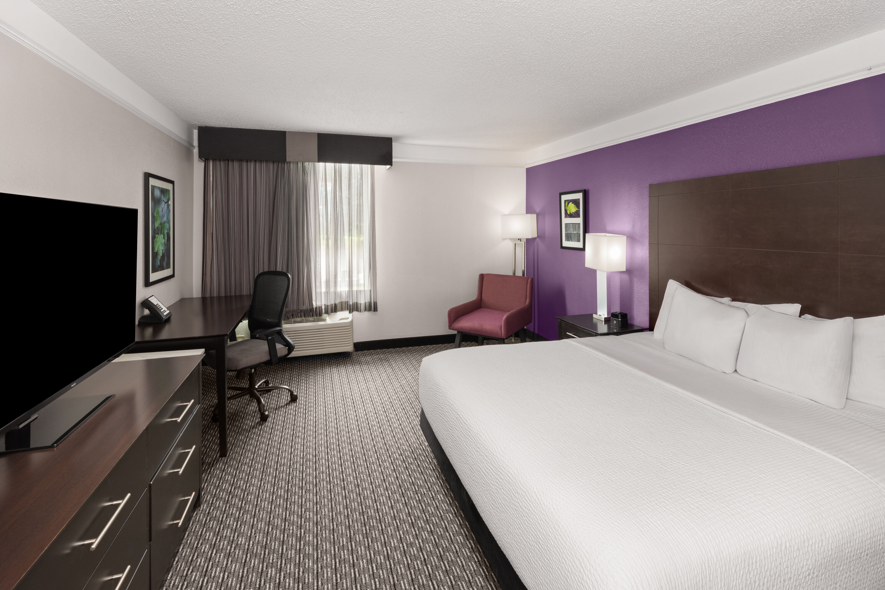 Guest room at the La Quinta Inn & Suites by Wyndham Austin Round Rock in Austin, Texas