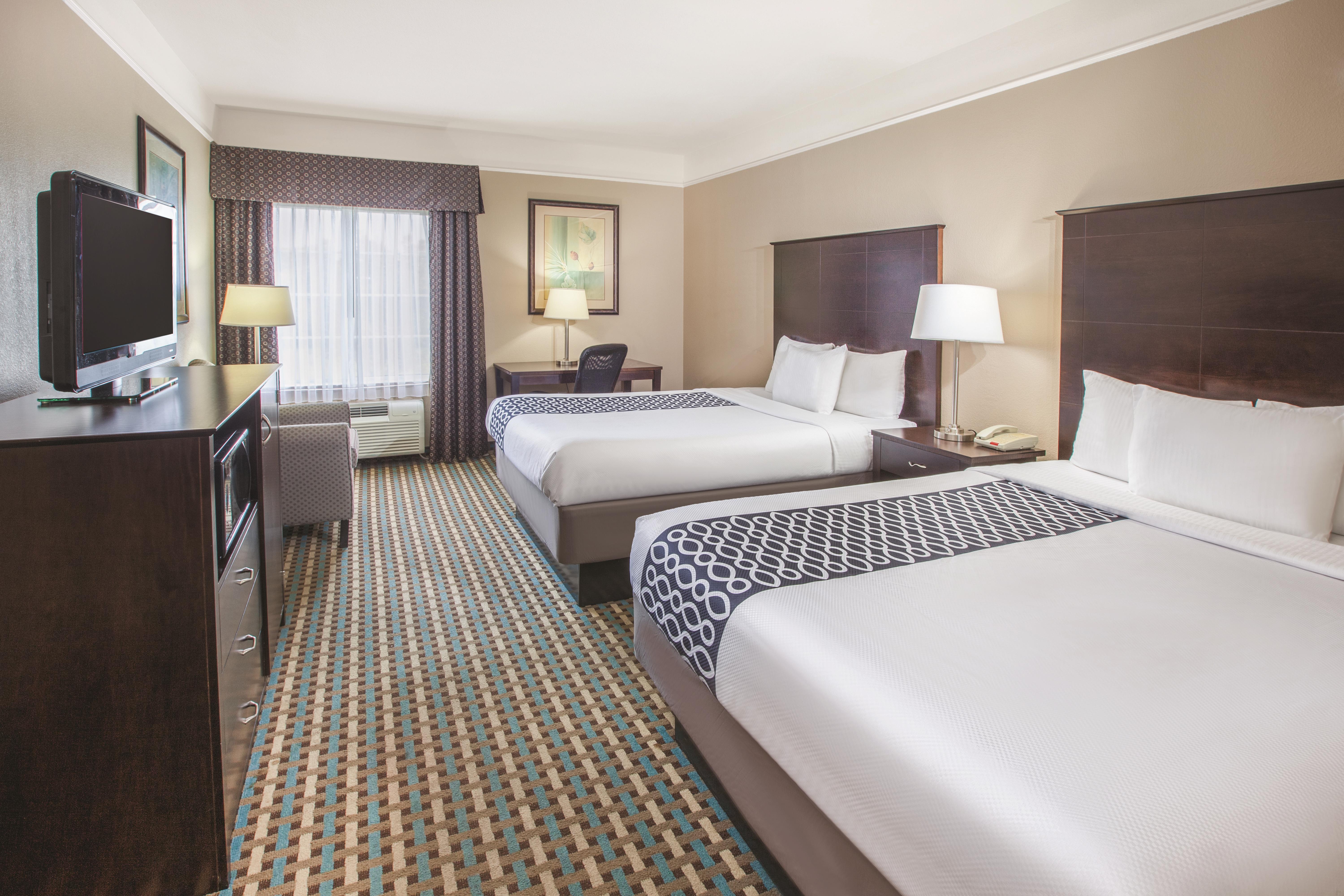 Guest room at the La Quinta Inn & Suites by Wyndham Bay City in Bay City, Texas