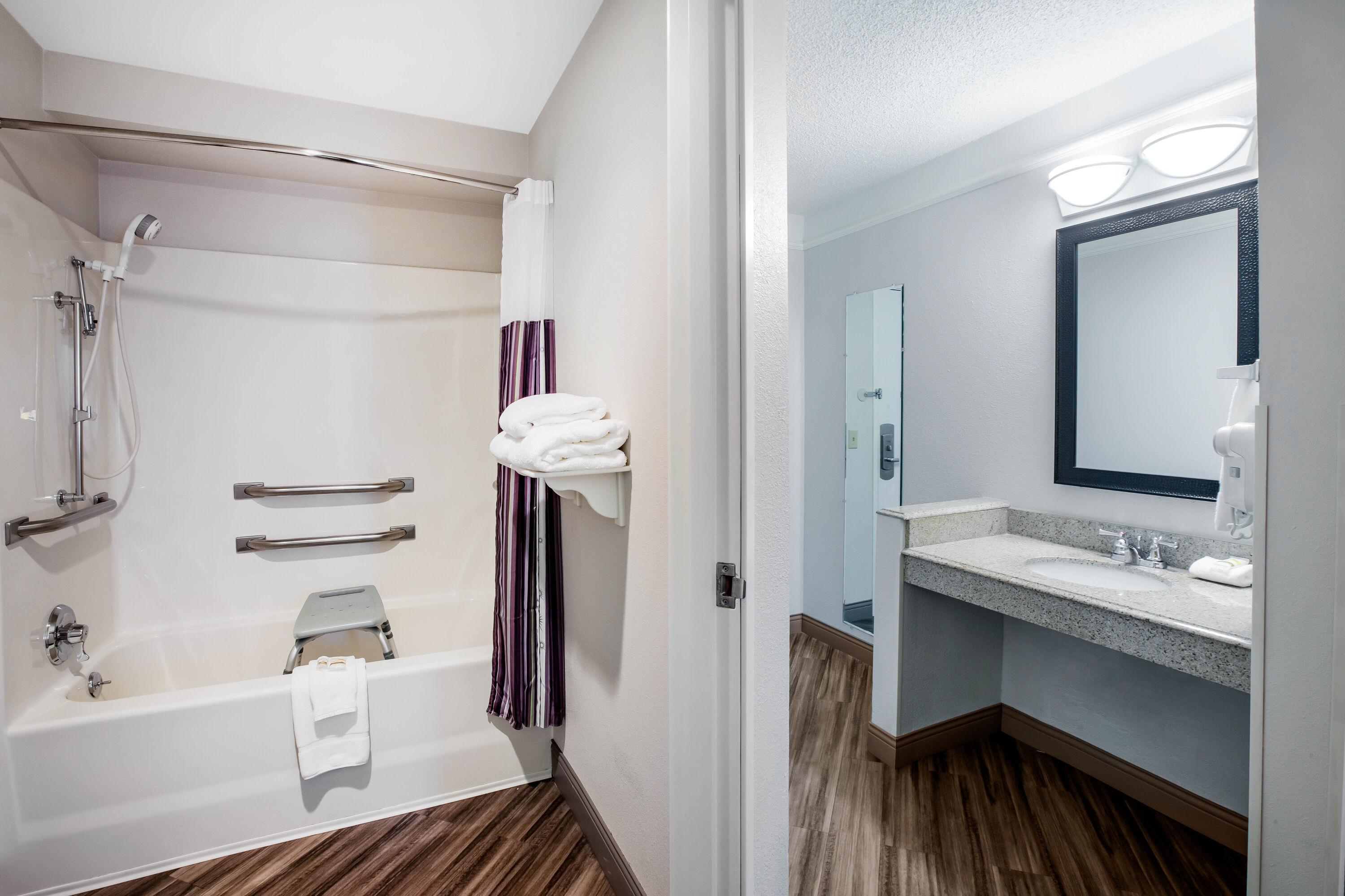 Guest room bath at the La Quinta Inn & Suites by Wyndham Houston Baytown East in Baytown, Texas
