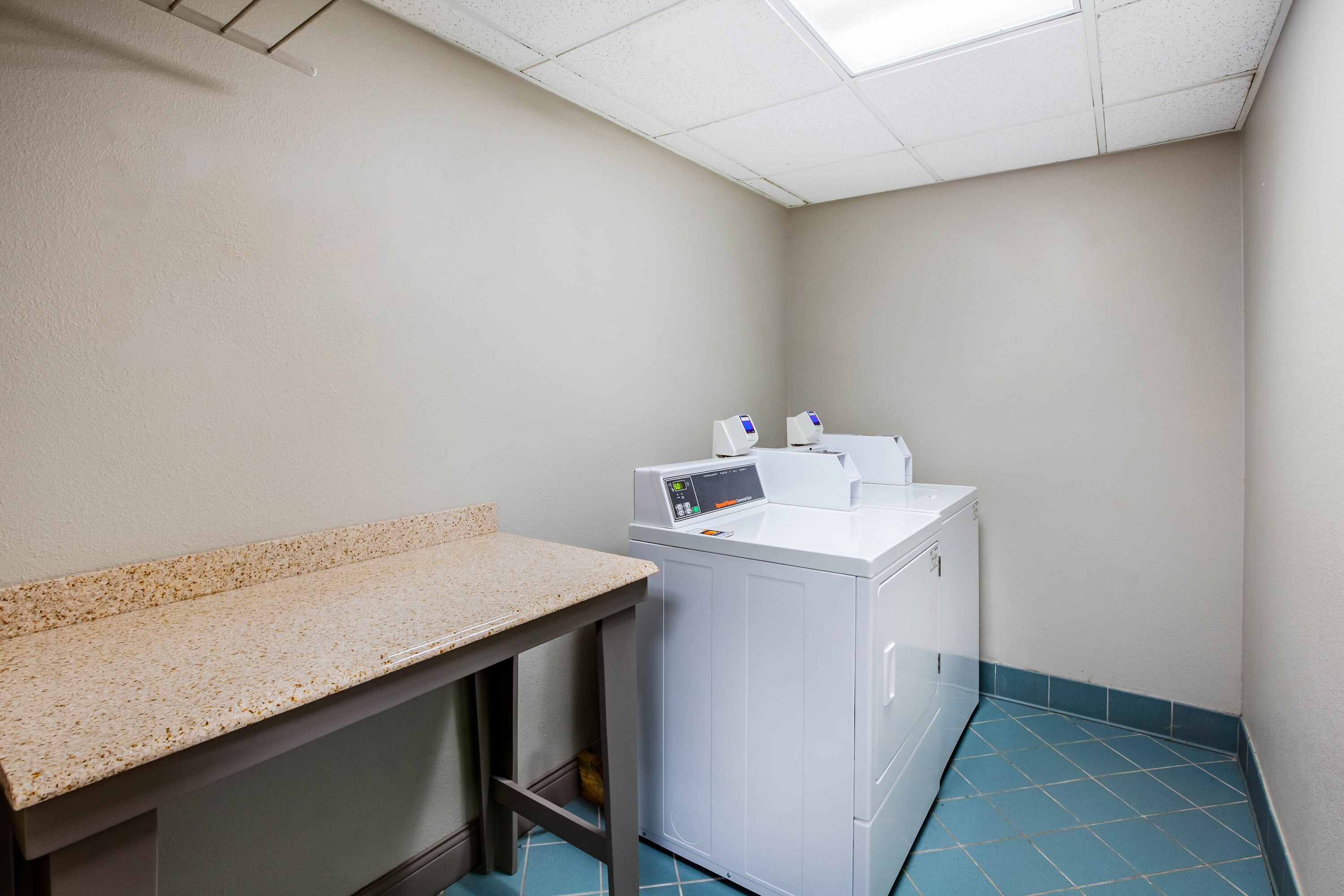 Laundry facilities at La Quinta Inn & Suites by Wyndham Houston Baytown East in Baytown, Texas