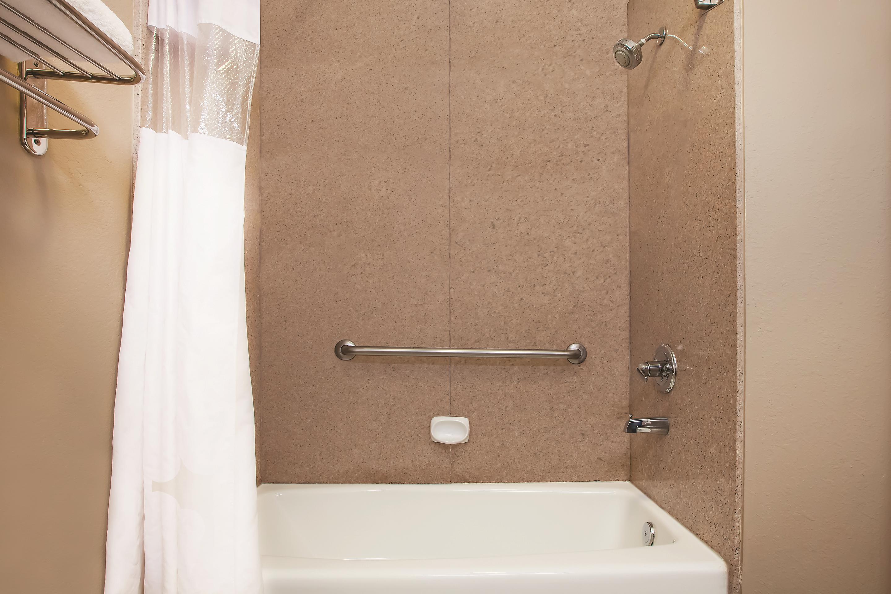 Guest room bath at the La Quinta Inn & Suites by Wyndham Beaumont West in Beaumont, Texas
