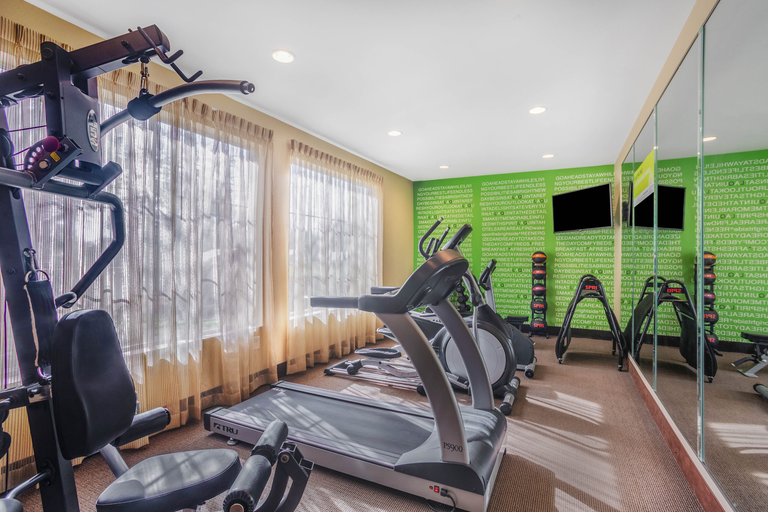 Fitness room at La Quinta Inn & Suites by Wyndham Beeville in Beeville, Texas