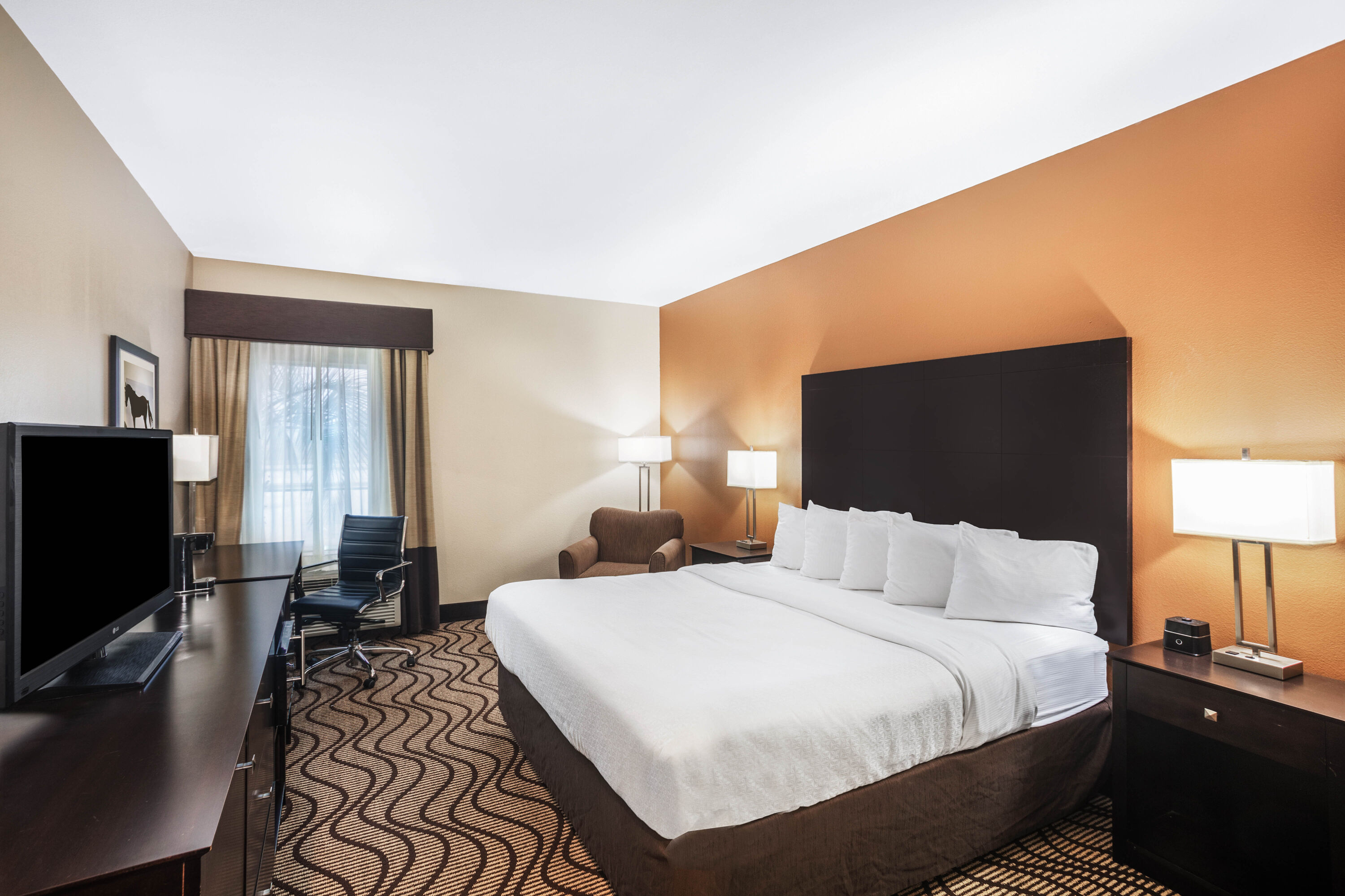 Guest room at the La Quinta Inn & Suites by Wyndham Beeville in Beeville, Texas
