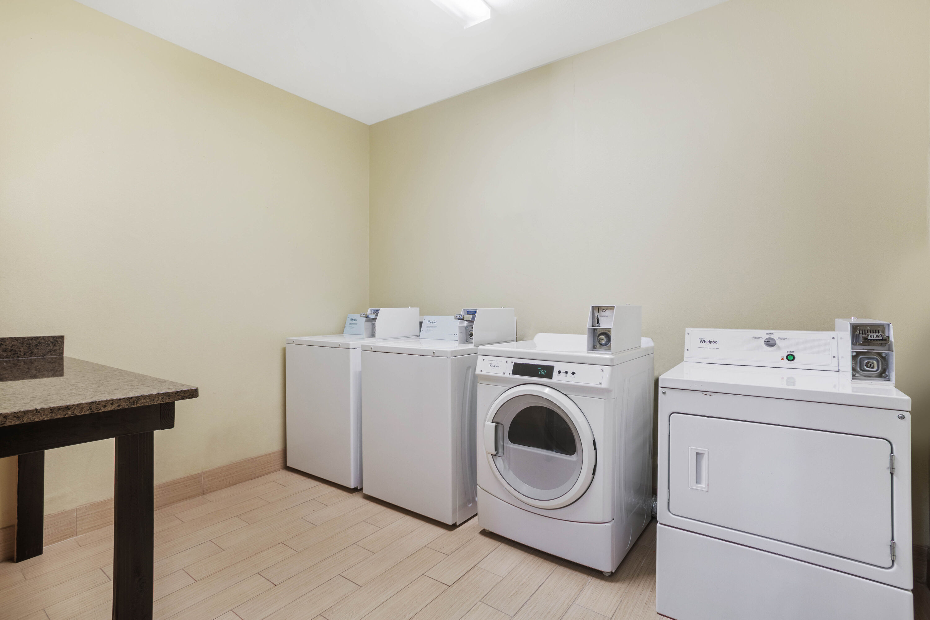 Laundry facilities at La Quinta Inn & Suites by Wyndham Beeville in Beeville, Texas