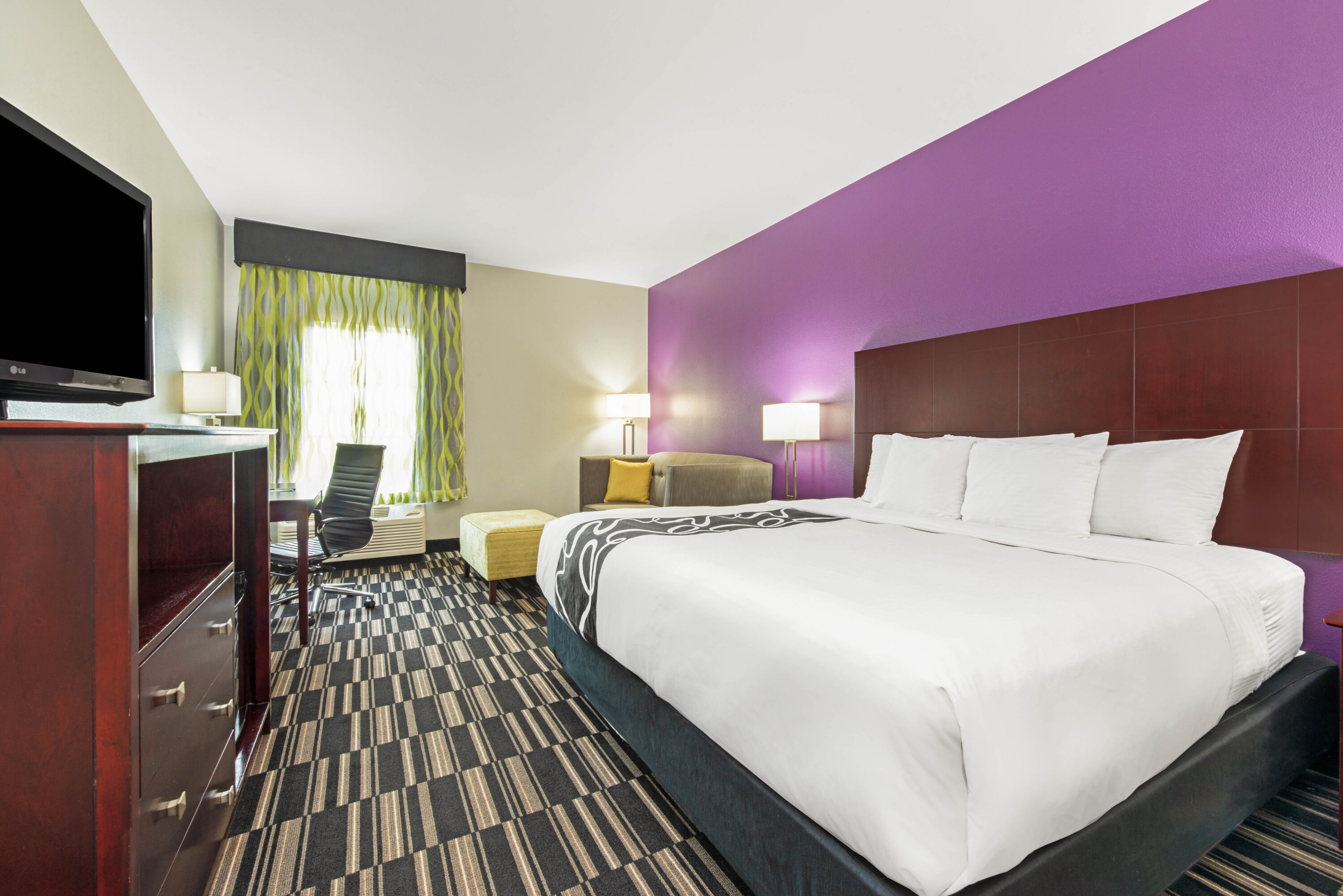 Guest room at the La Quinta Inn & Suites by Wyndham Bridge City in Bridge City, Texas