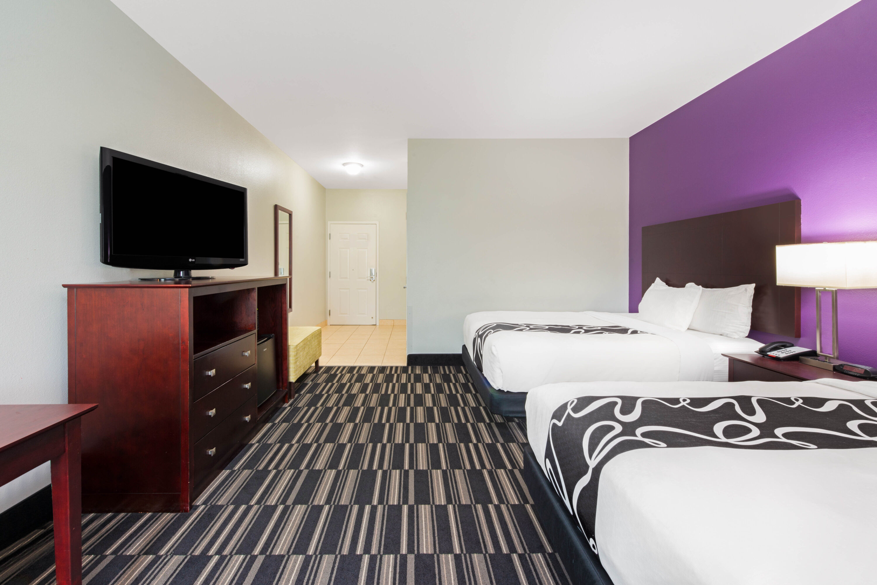 Guest room at the La Quinta Inn & Suites by Wyndham Bridge City in Bridge City, Texas