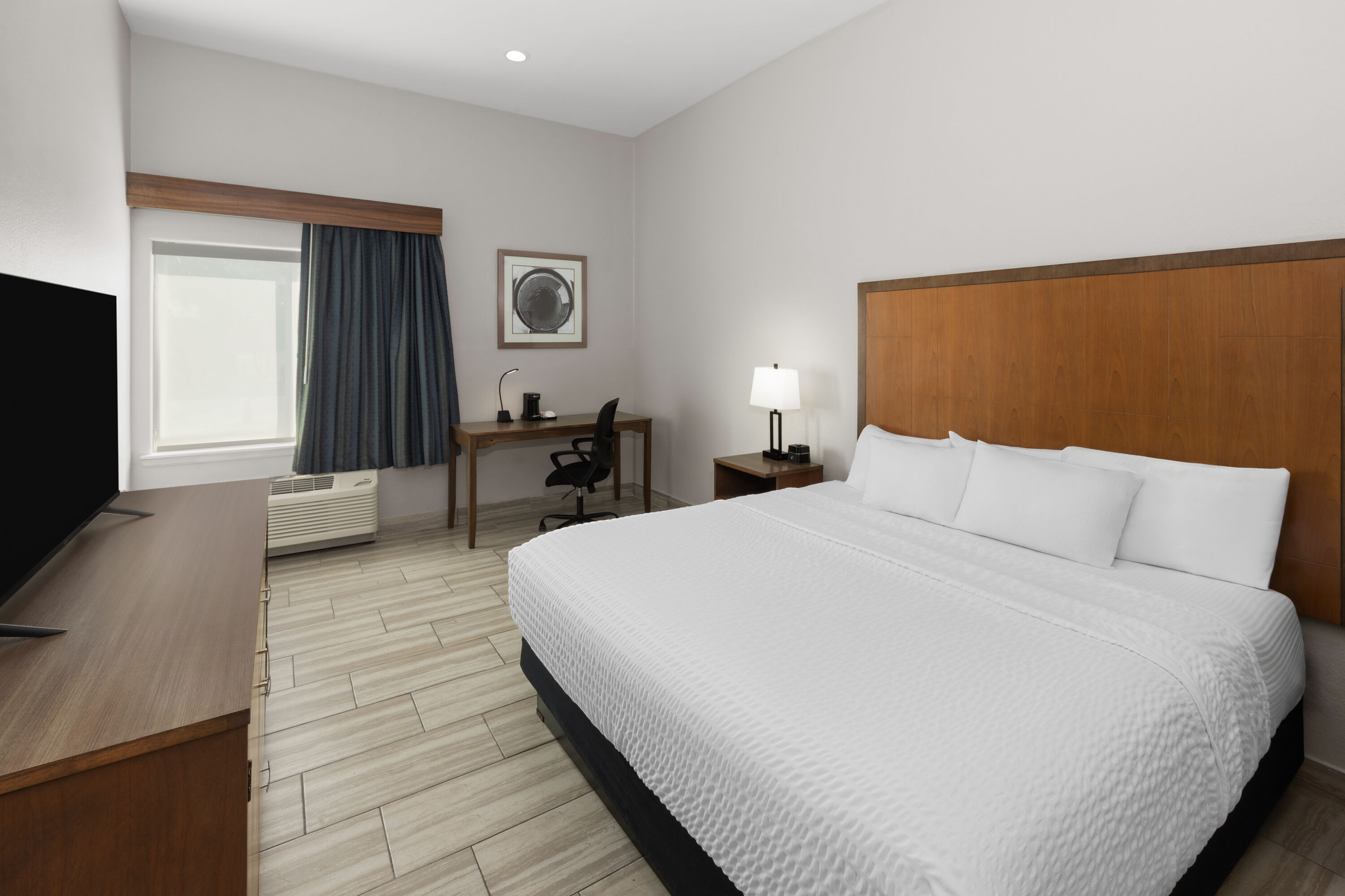Guest room at the La Quinta Inn & Suites by Wyndham Brownsville North in Brownsville, Texas