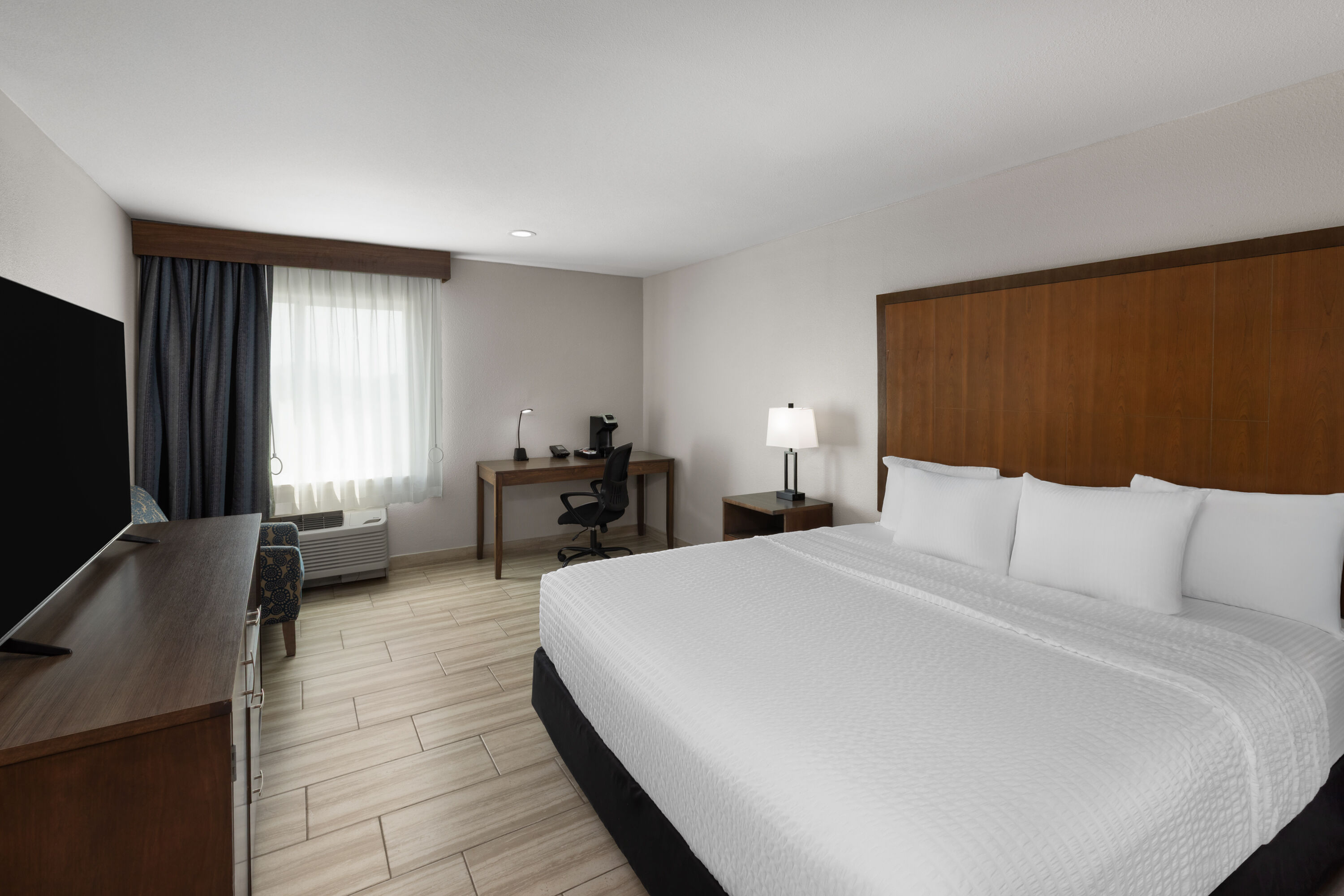Guest room at the La Quinta Inn & Suites by Wyndham Brownsville North in Brownsville, Texas