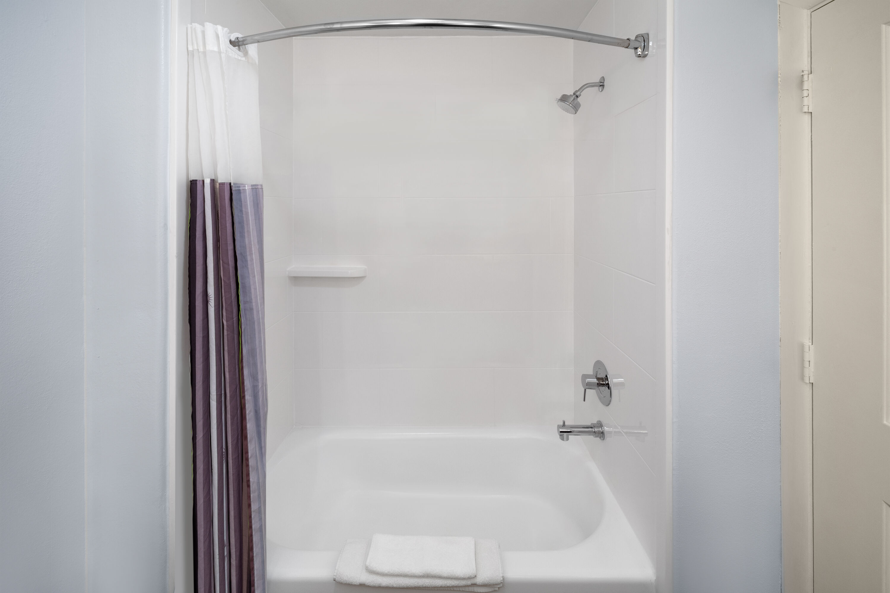 Guest room bath at the La Quinta Inn & Suites by Wyndham Austin - Cedar Park in Cedar Park, Texas