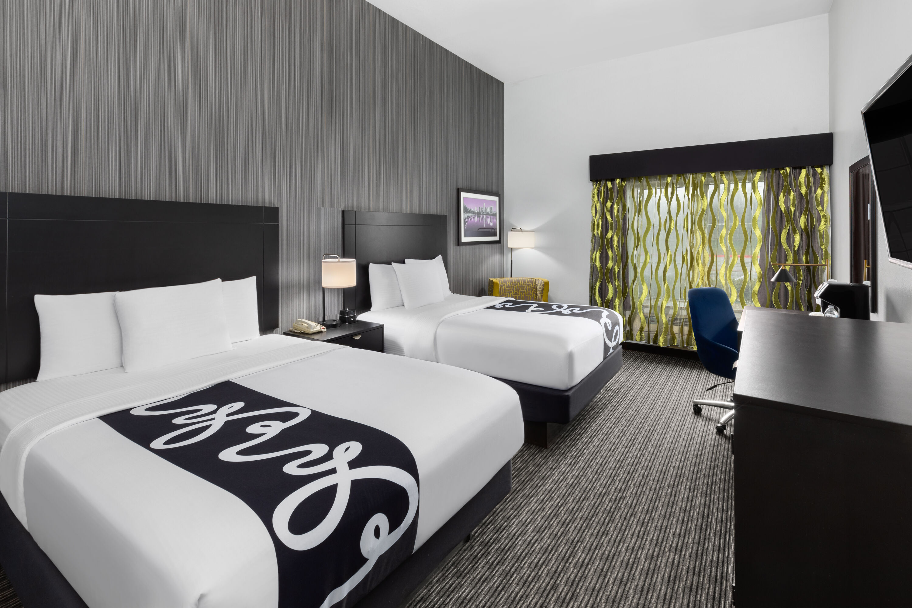 Guest room at the La Quinta Inn & Suites by Wyndham Austin - Cedar Park in Cedar Park, Texas