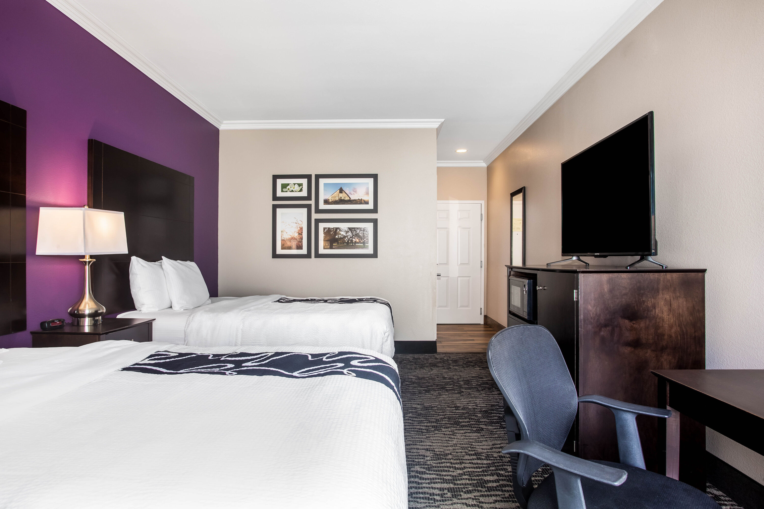 Guest room at the La Quinta Inn & Suites by Wyndham Columbus TX in Columbus, Texas