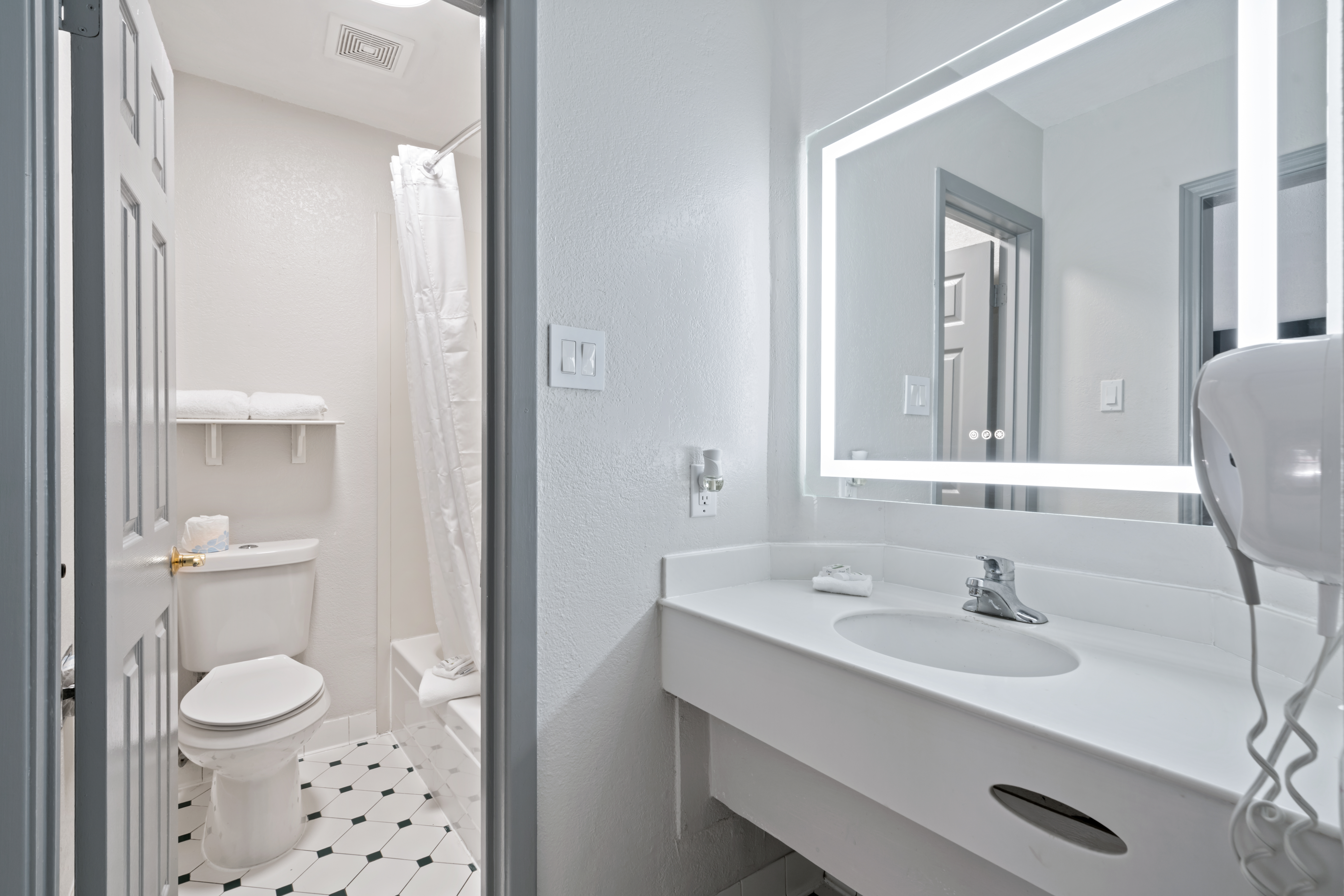 Guest room bath at the La Quinta Inn by Wyndham Corpus Christi North in Corpus Christi, Texas