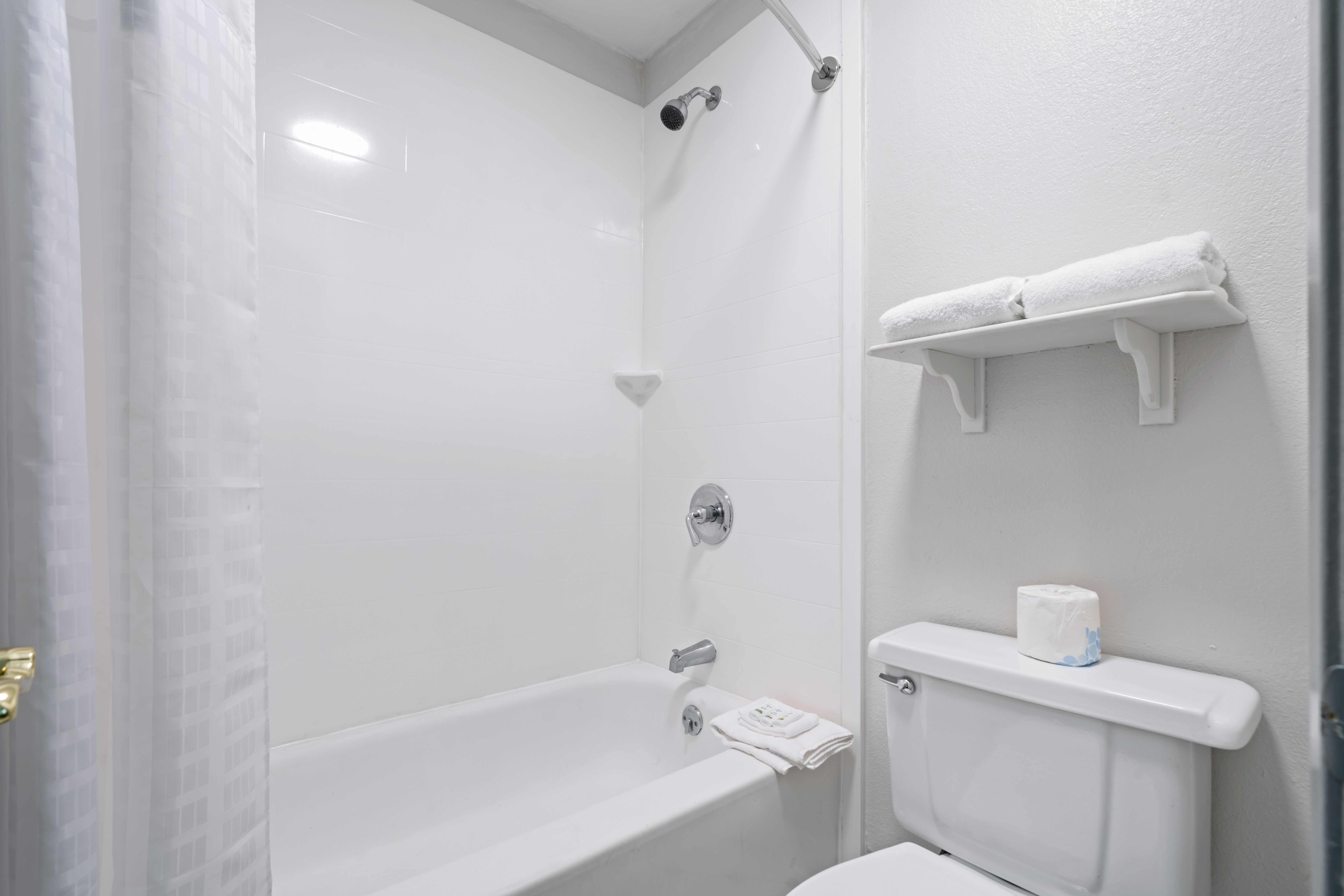 Guest room bath at the La Quinta Inn by Wyndham Corpus Christi North in Corpus Christi, Texas