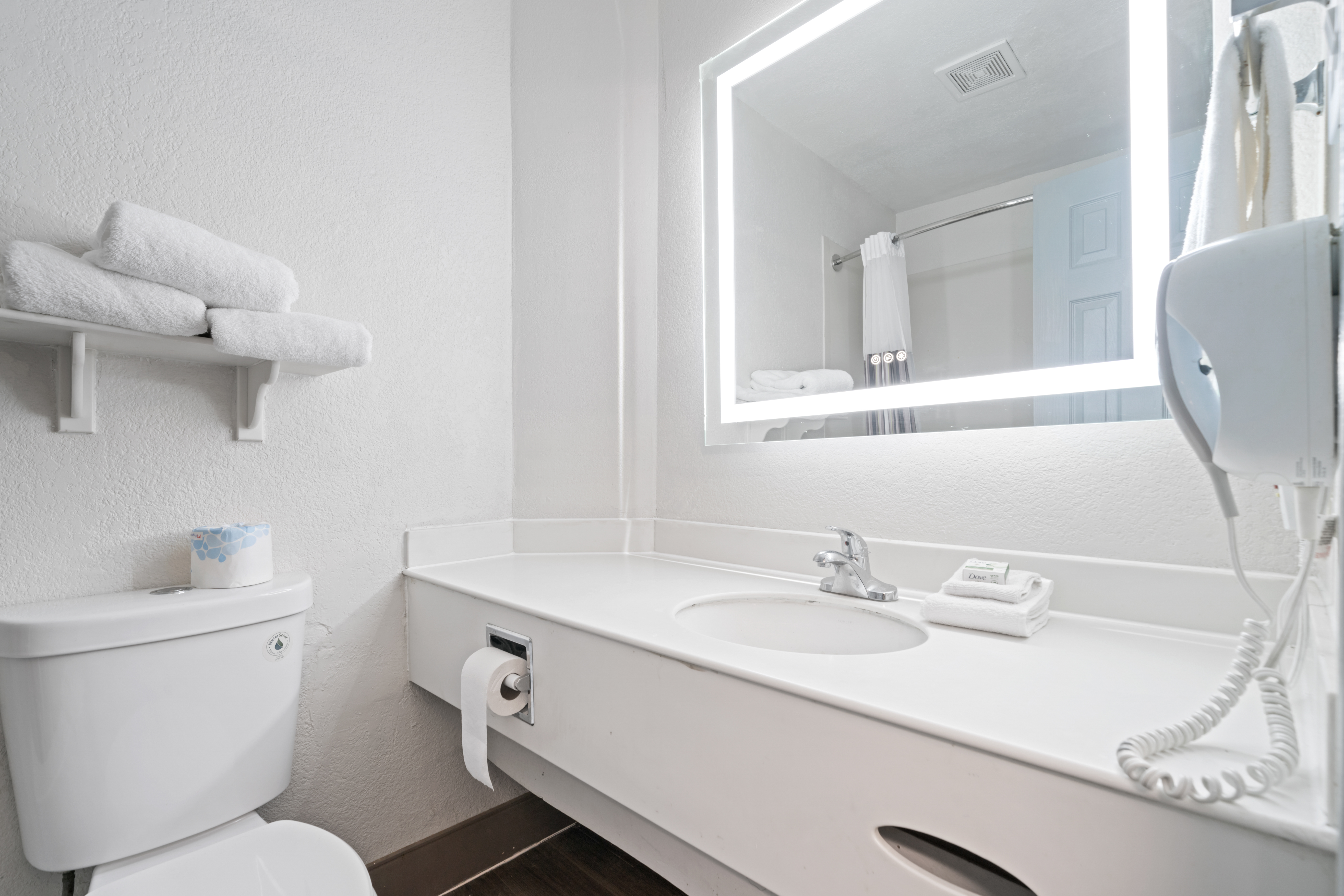 Guest room bath at the La Quinta Inn by Wyndham Corpus Christi North in Corpus Christi, Texas