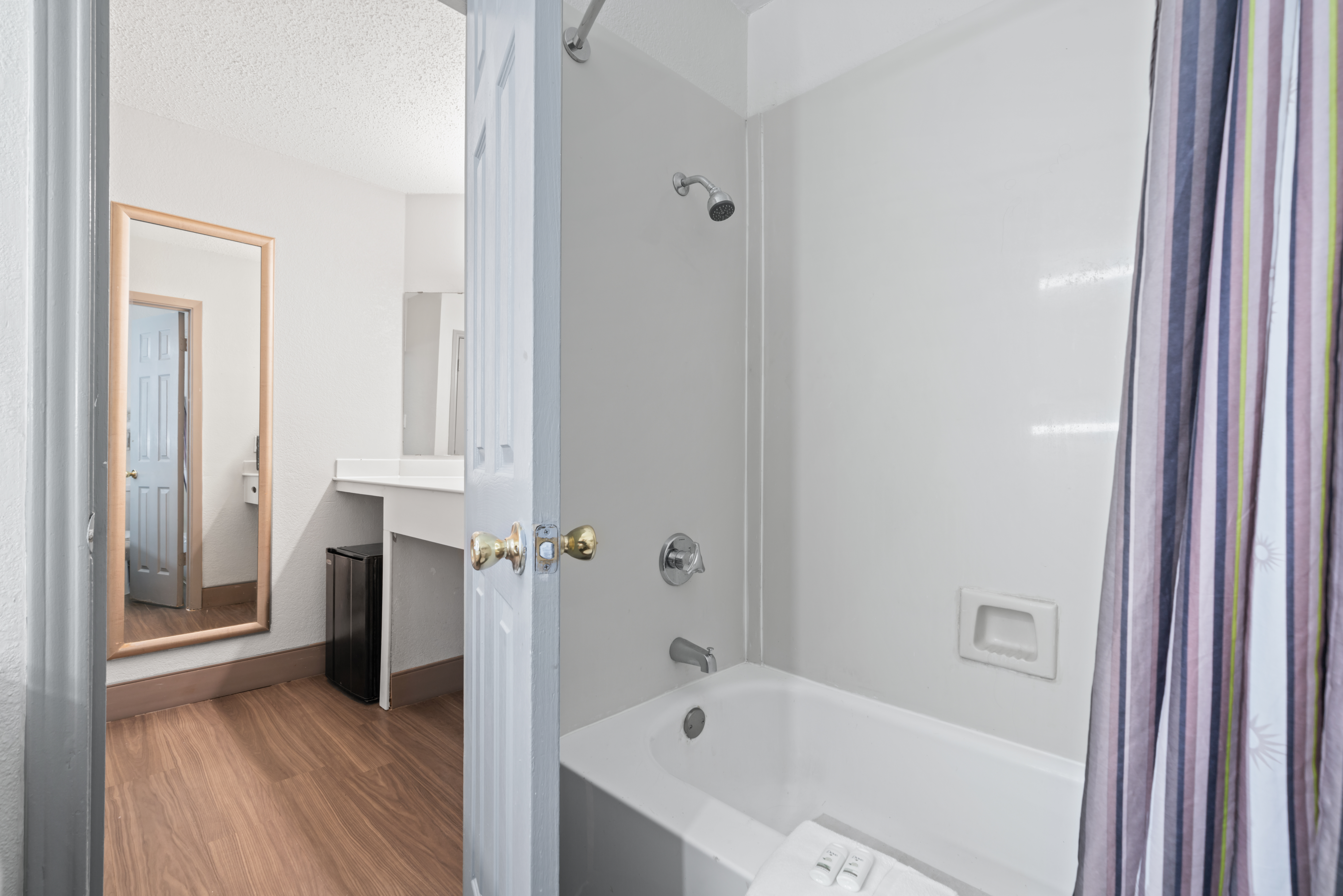 Guest room bath at the La Quinta Inn by Wyndham Corpus Christi North in Corpus Christi, Texas