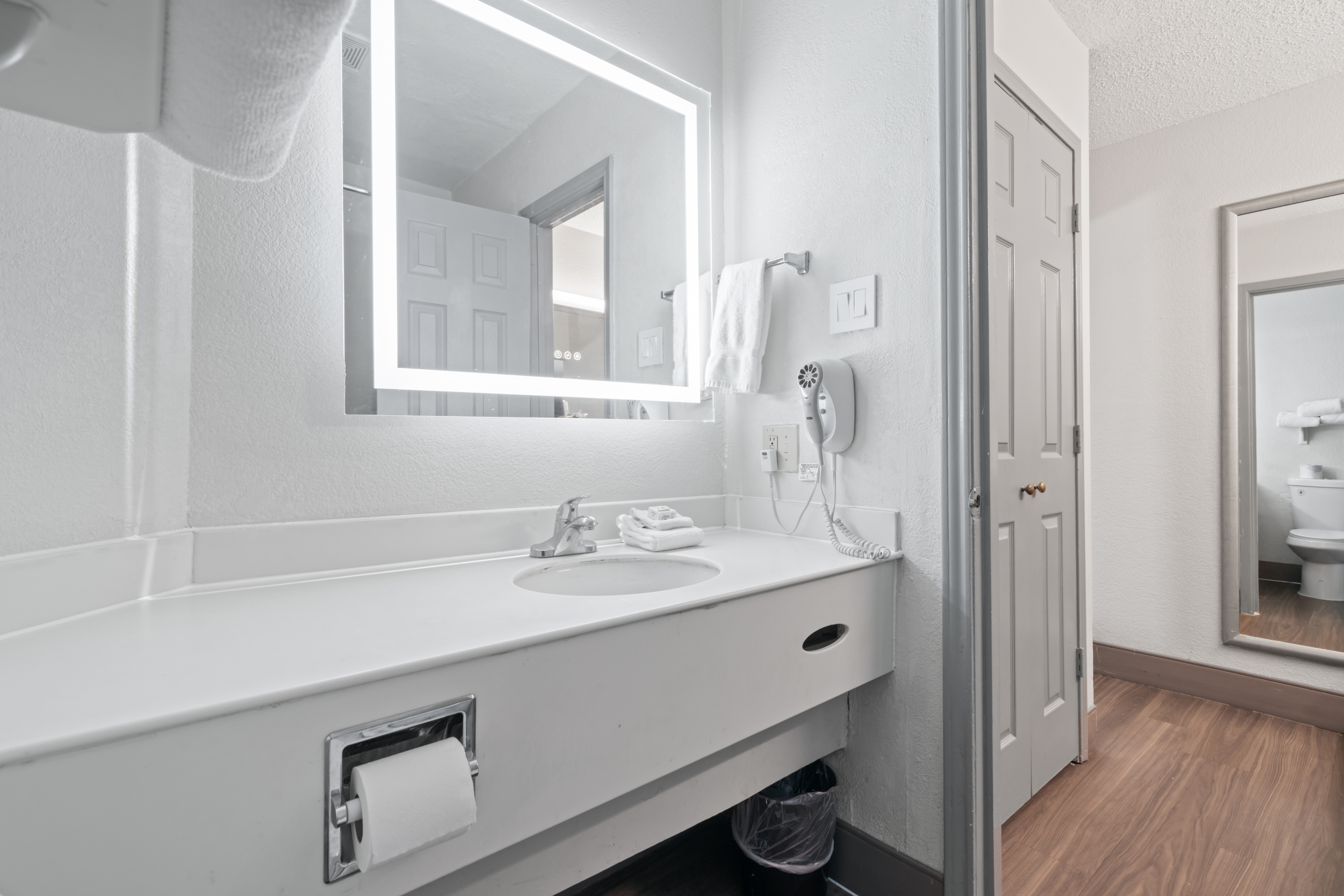 Guest room bath at the La Quinta Inn by Wyndham Corpus Christi North in Corpus Christi, Texas