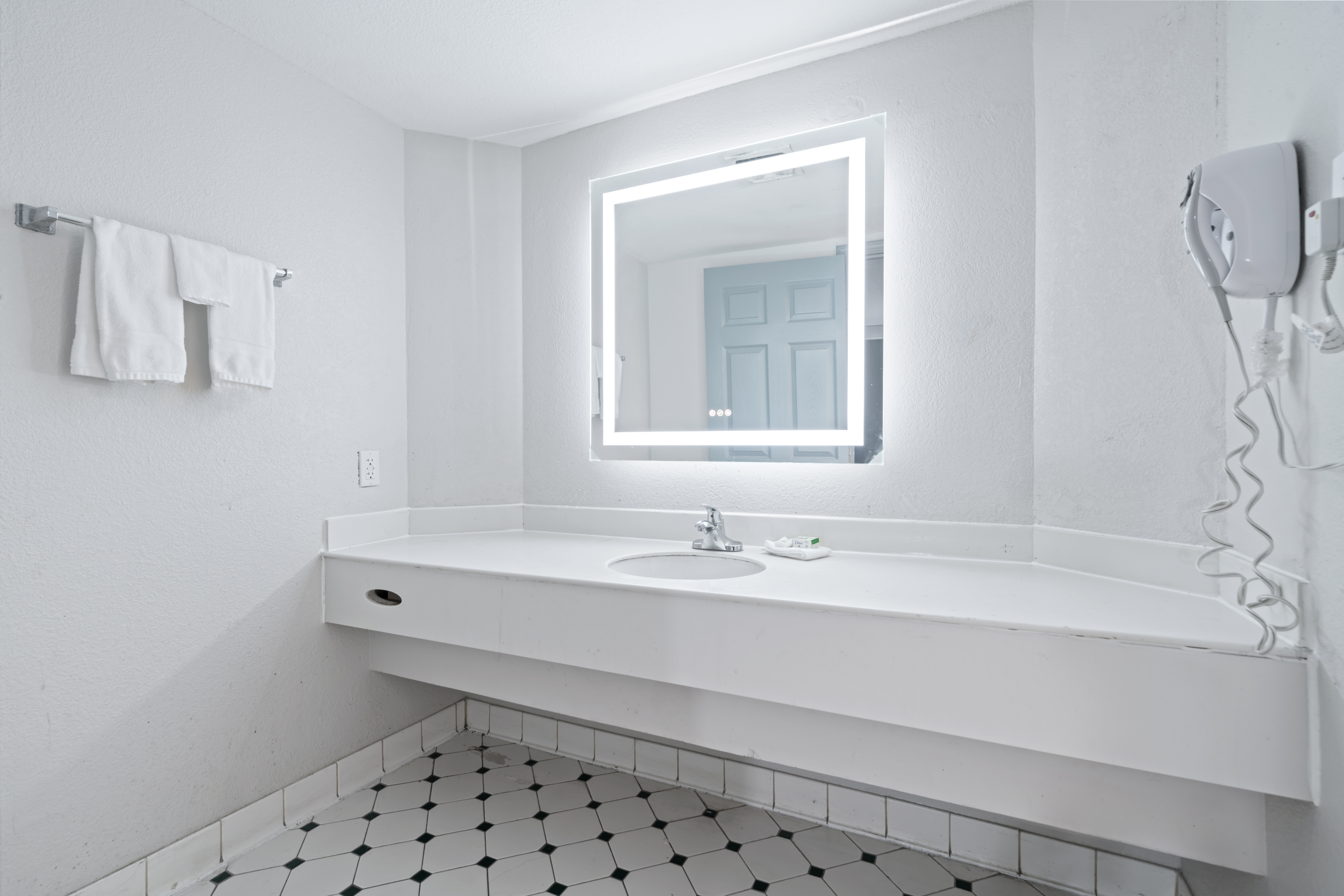 Guest room bath at the La Quinta Inn by Wyndham Corpus Christi North in Corpus Christi, Texas