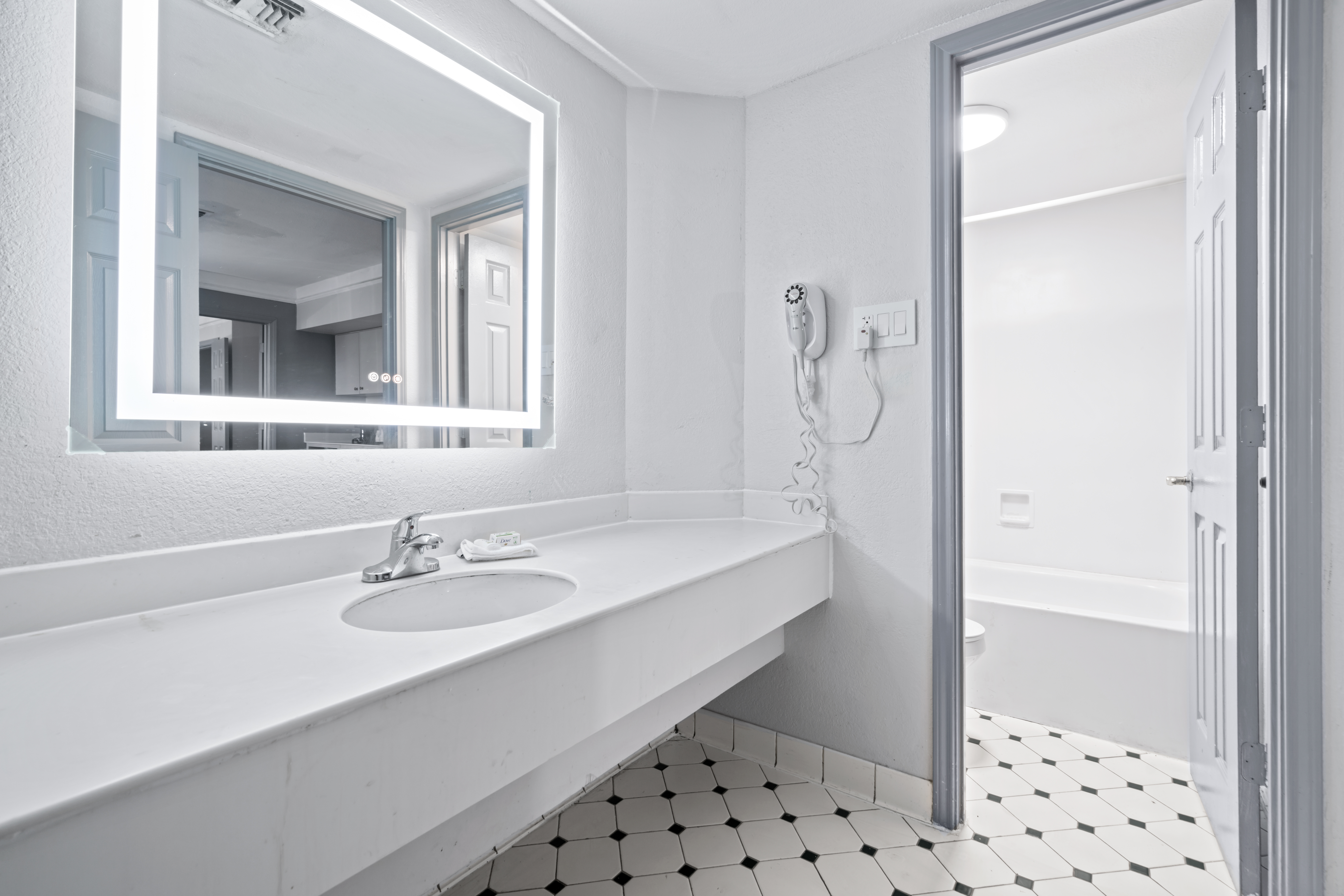 Guest room bath at the La Quinta Inn by Wyndham Corpus Christi North in Corpus Christi, Texas