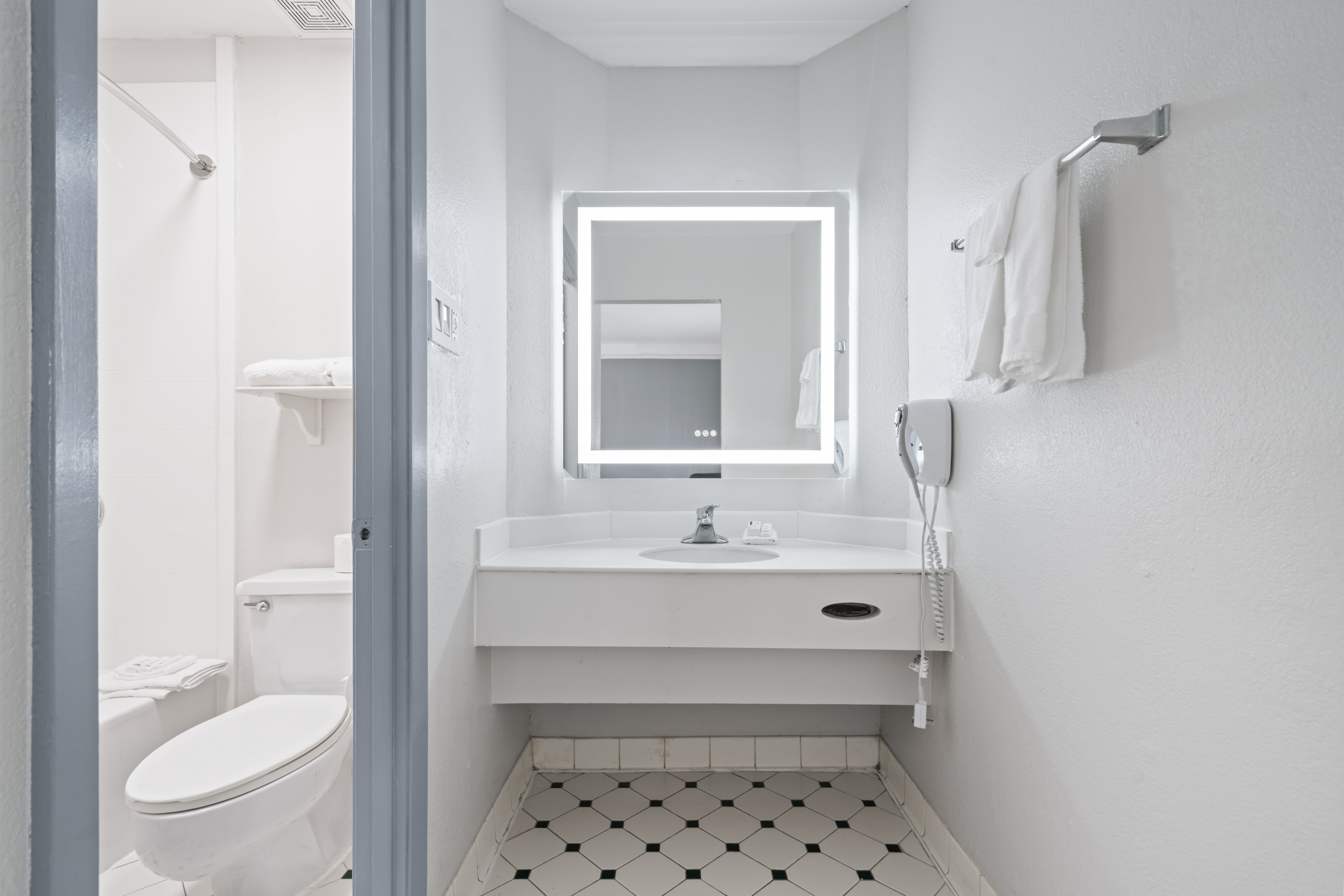 Guest room bath at the La Quinta Inn by Wyndham Corpus Christi North in Corpus Christi, Texas