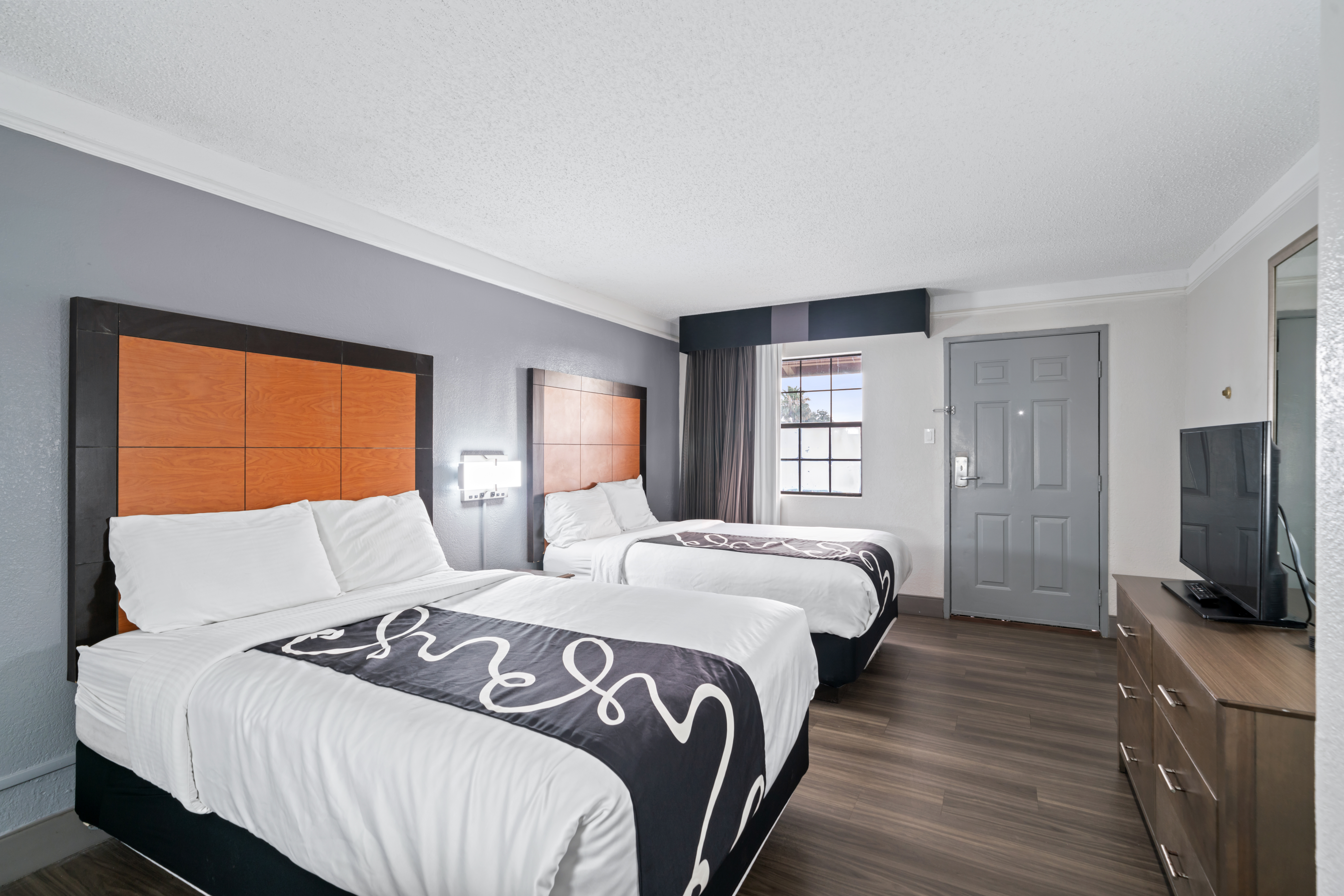 Guest room at the La Quinta Inn by Wyndham Corpus Christi North in Corpus Christi, Texas