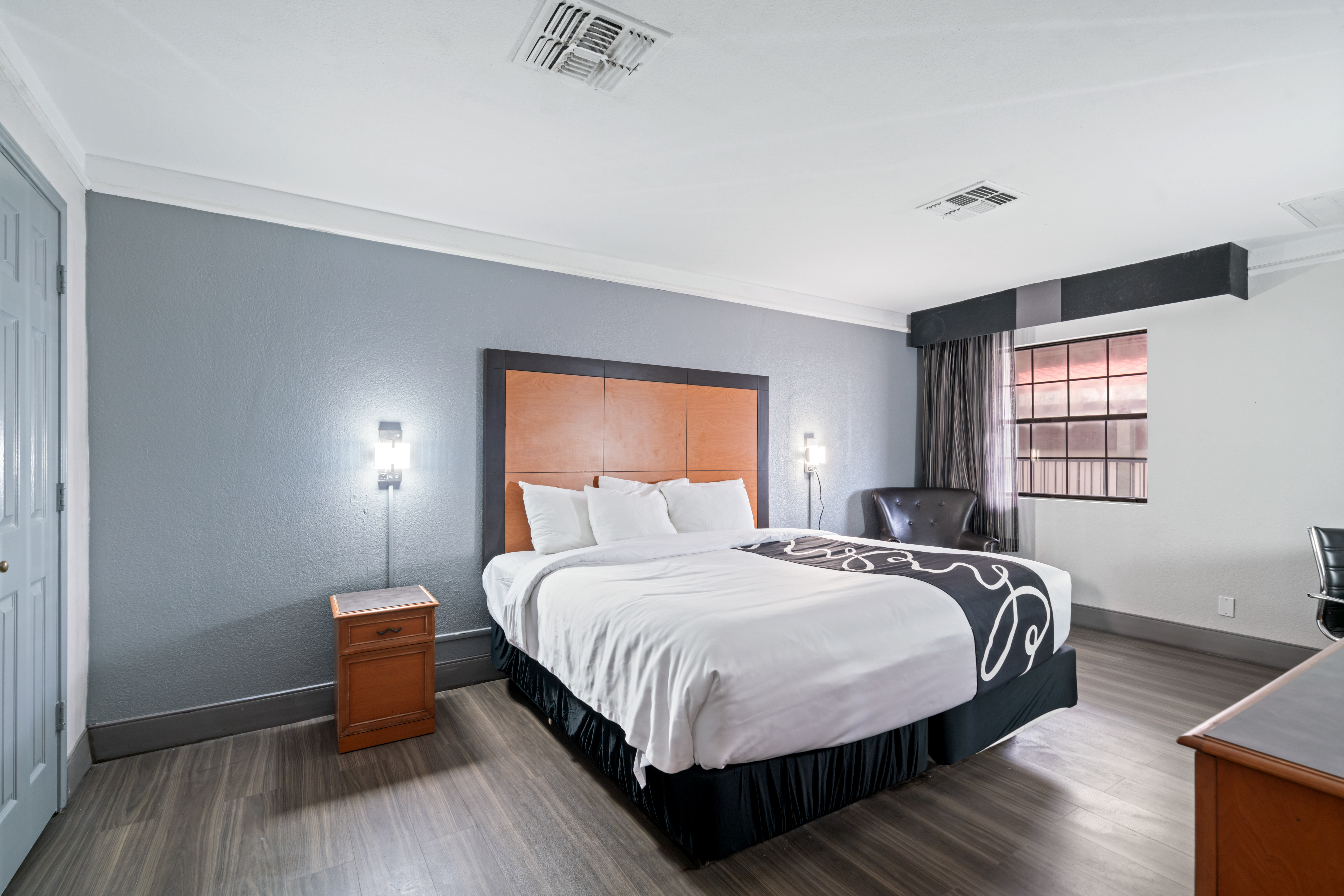 Guest room at the La Quinta Inn by Wyndham Corpus Christi North in Corpus Christi, Texas