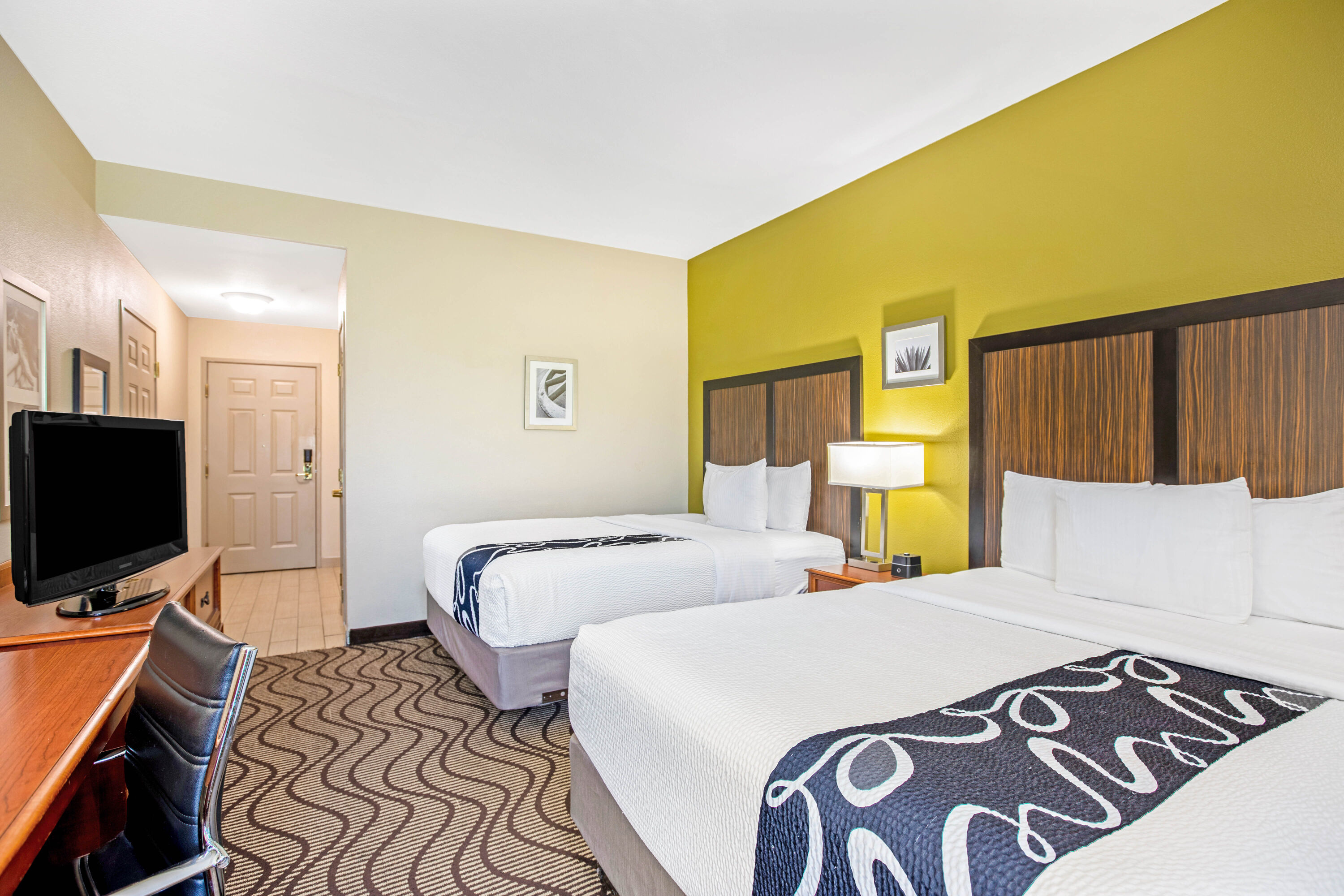 Guest room at the La Quinta Inn & Suites by Wyndham Corpus Christi Northwest in Corpus Christi, Texas
