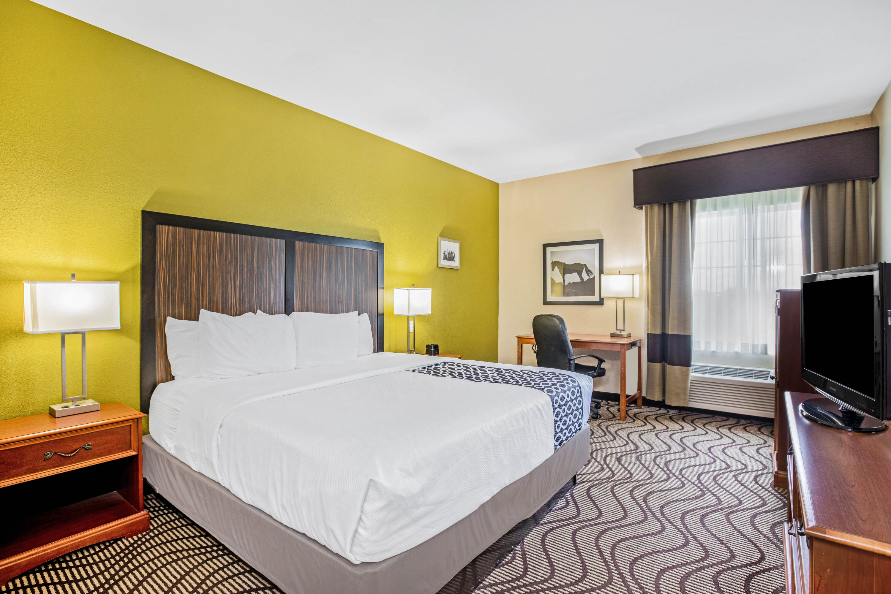 Guest room at the La Quinta Inn & Suites by Wyndham Corpus Christi Northwest in Corpus Christi, Texas