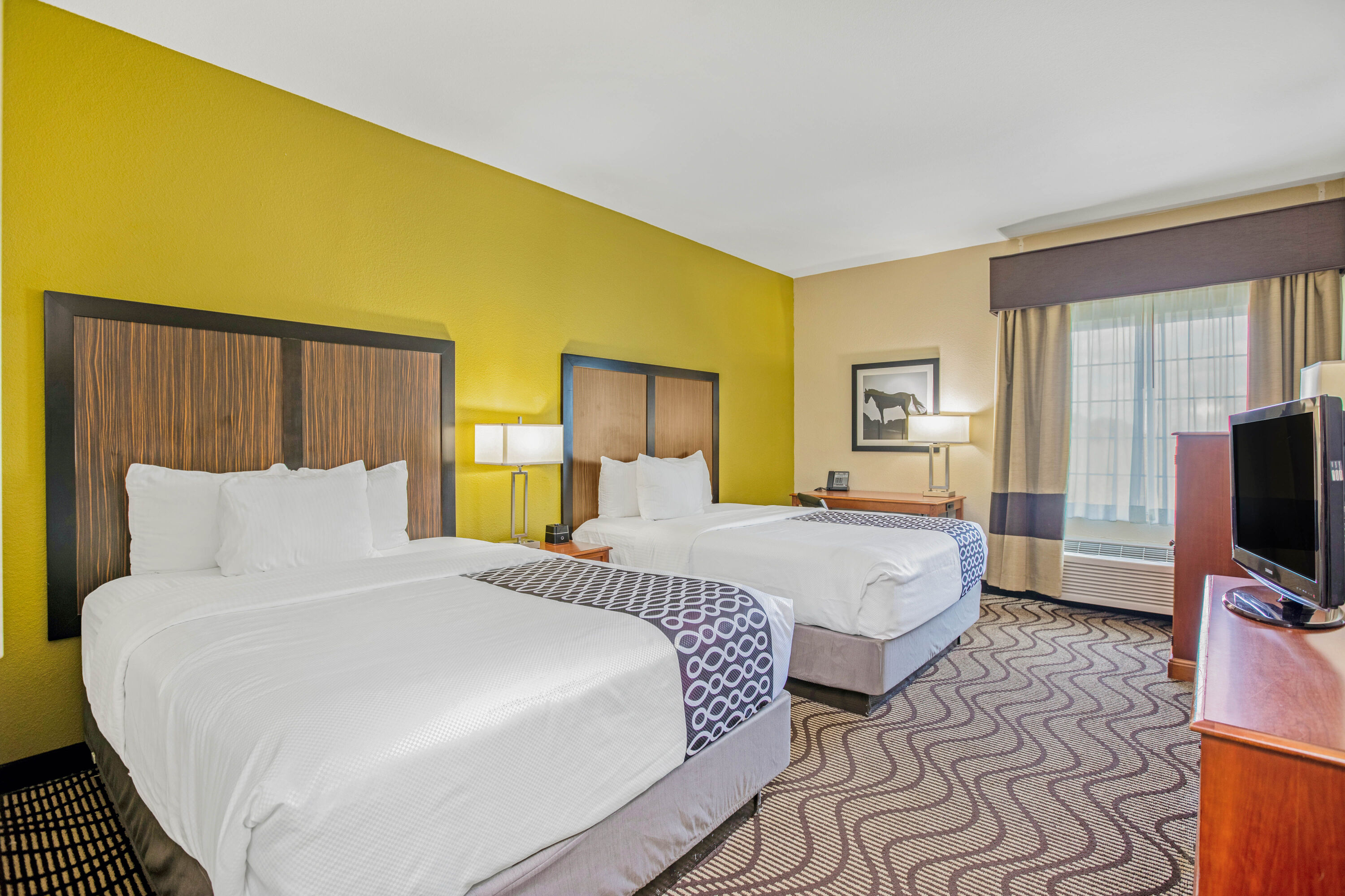 Guest room at the La Quinta Inn & Suites by Wyndham Corpus Christi Northwest in Corpus Christi, Texas