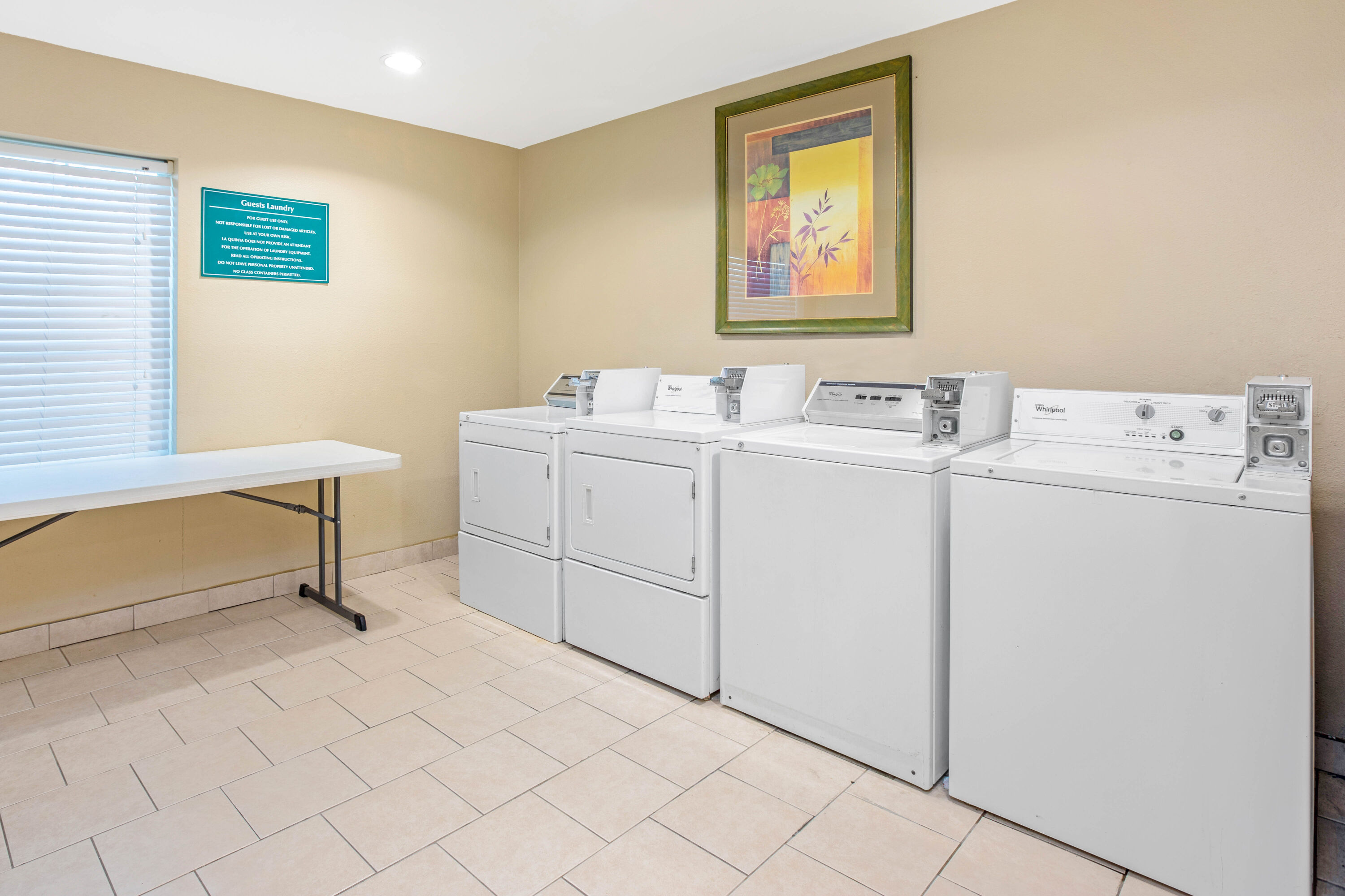 Laundry facilities at La Quinta Inn & Suites by Wyndham Corpus Christi Northwest in Corpus Christi, Texas