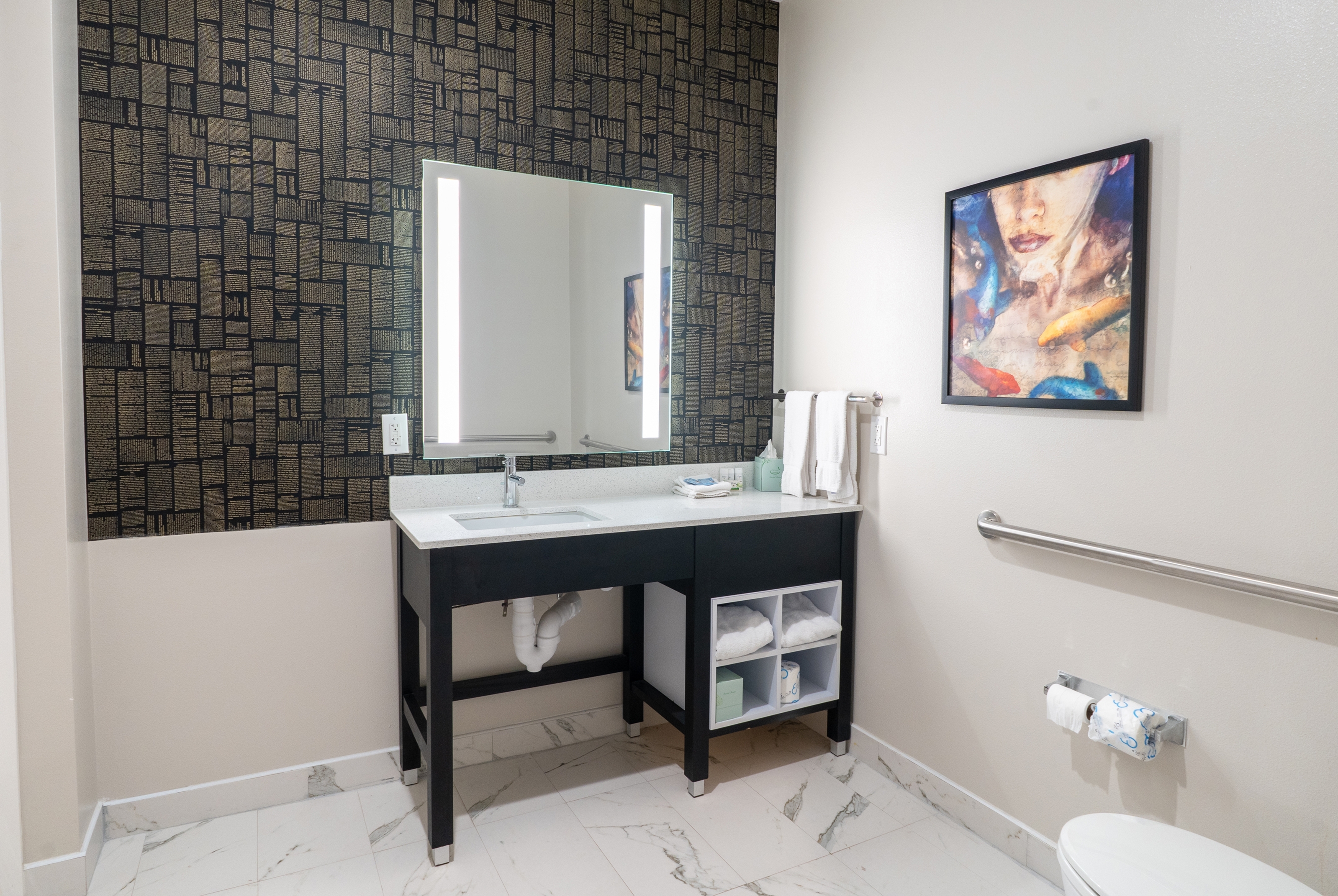 Guest room bath at the La Quinta Inn & Suites by Wyndham Corpus Christi Southeast in Corpus Christi, Texas