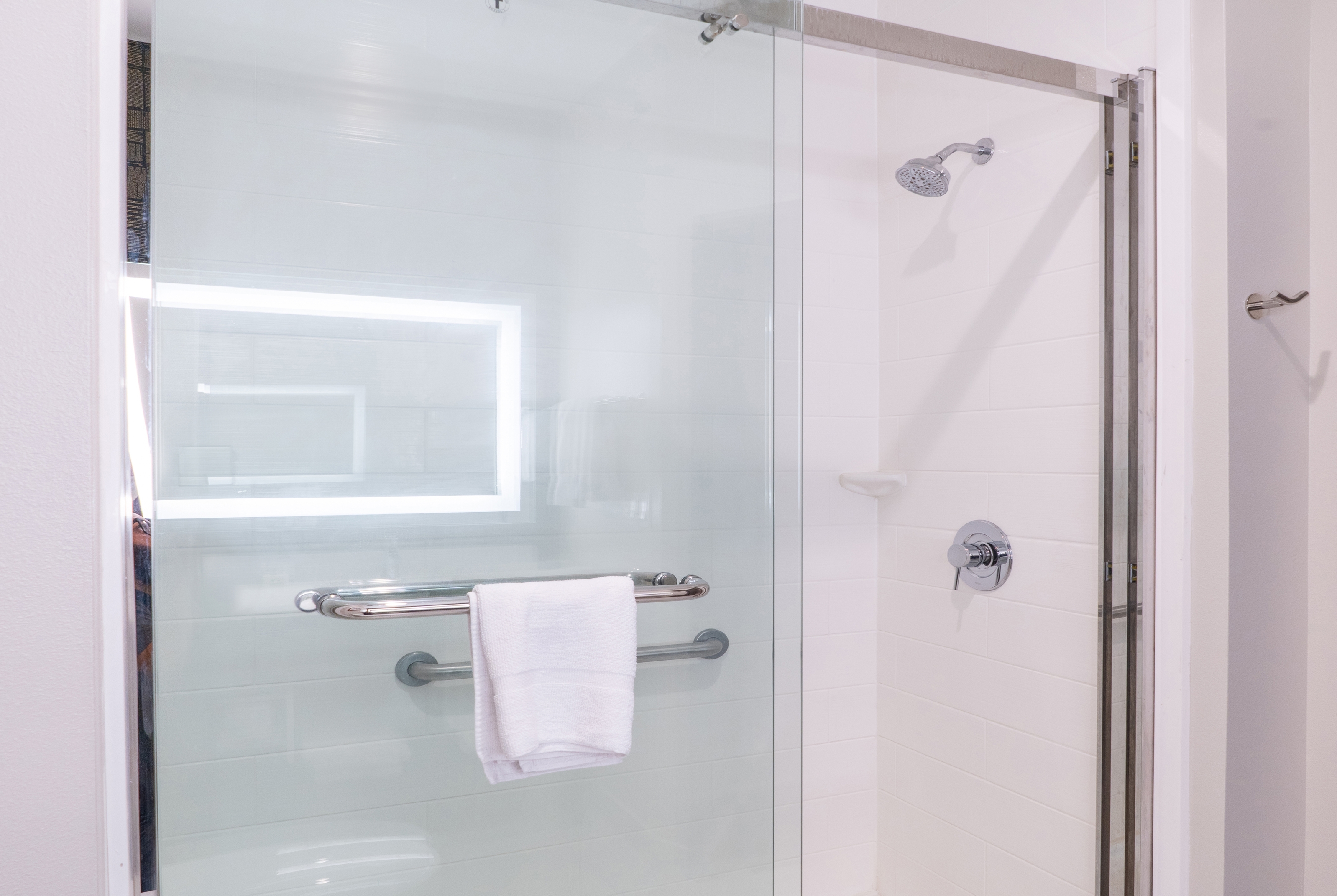 Guest room bath at the La Quinta Inn & Suites by Wyndham Corpus Christi Southeast in Corpus Christi, Texas