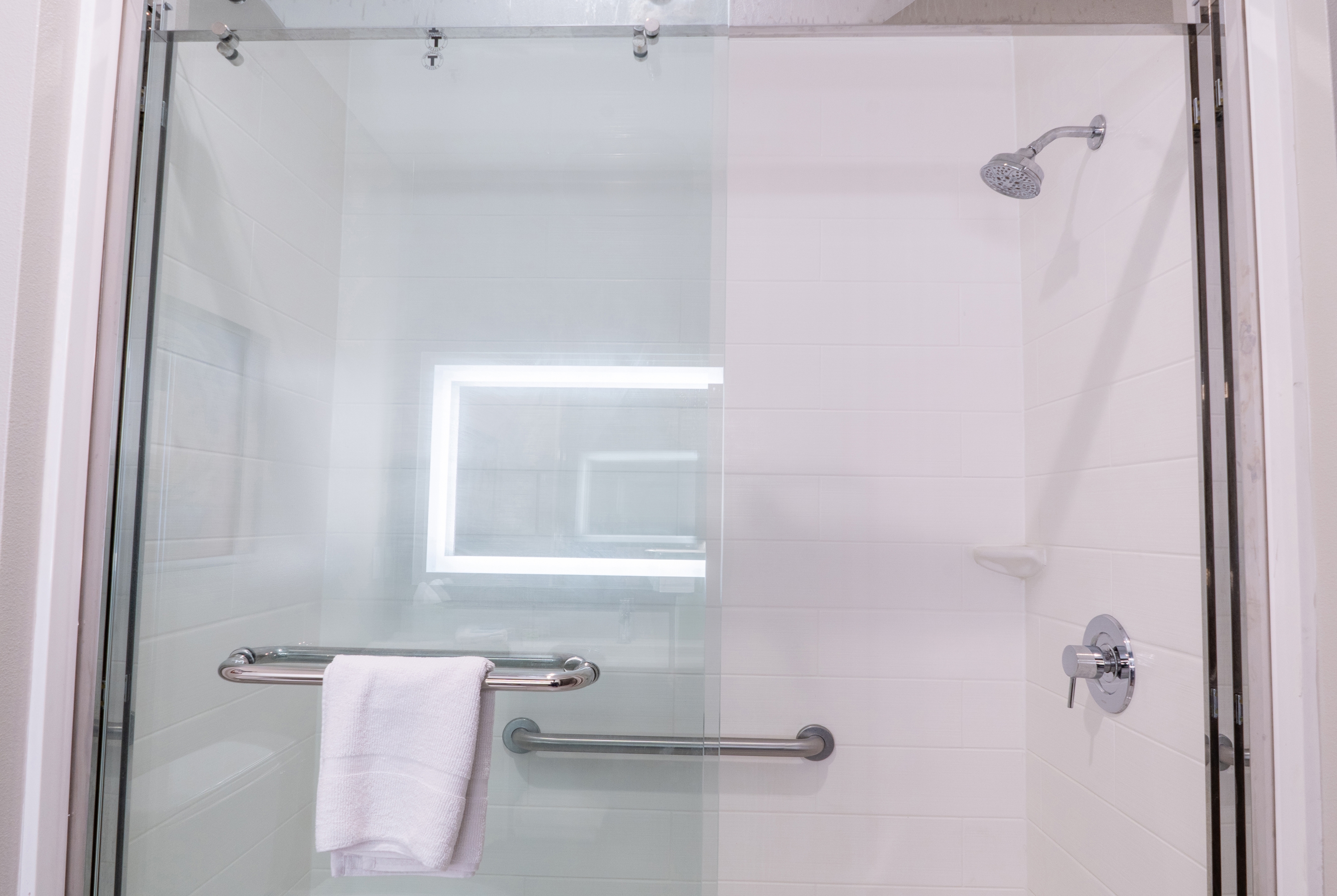 Guest room bath at the La Quinta Inn & Suites by Wyndham Corpus Christi Southeast in Corpus Christi, Texas