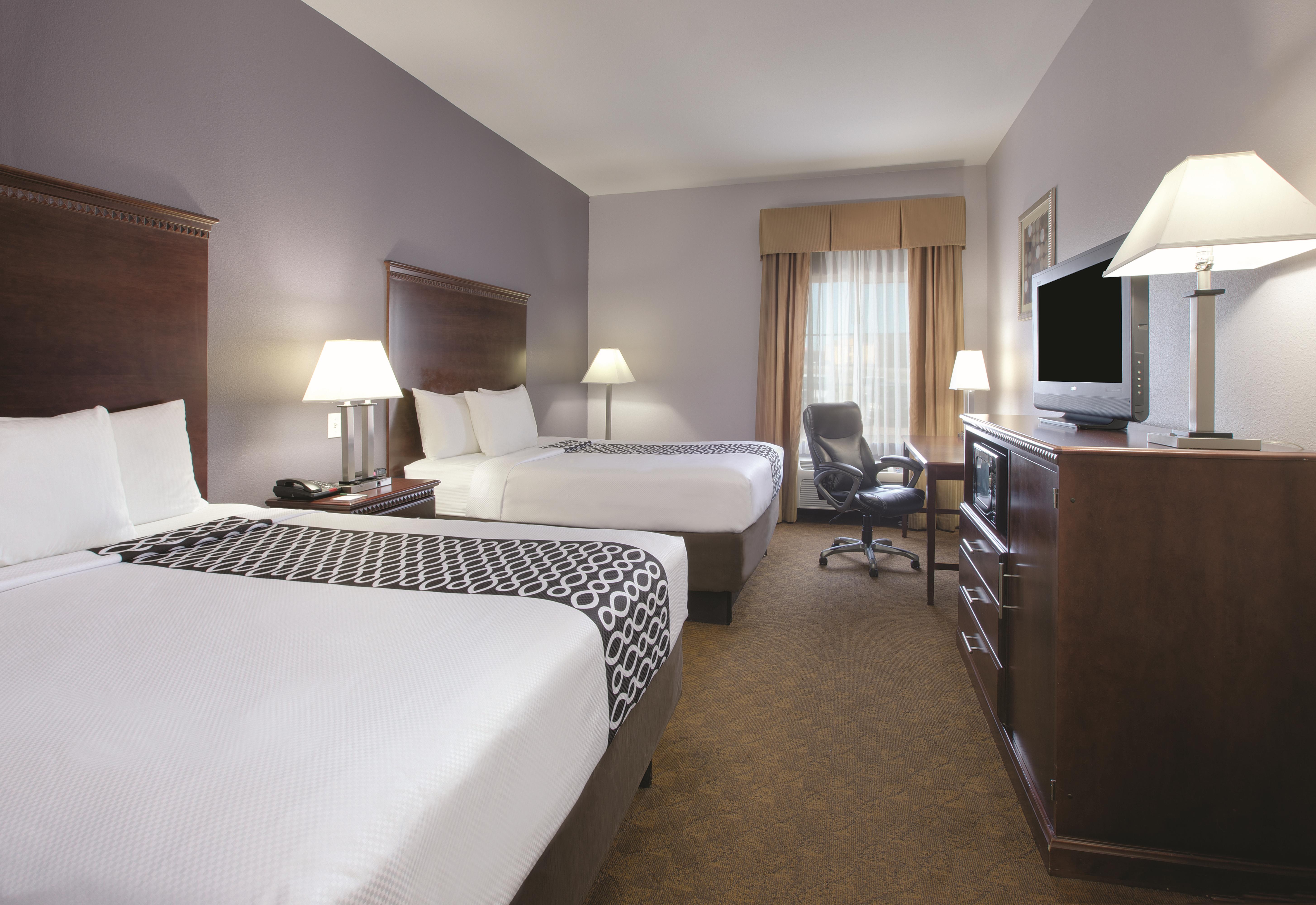 Guest room at the La Quinta Inn & Suites by Wyndham Corsicana in Corsicana, Texas