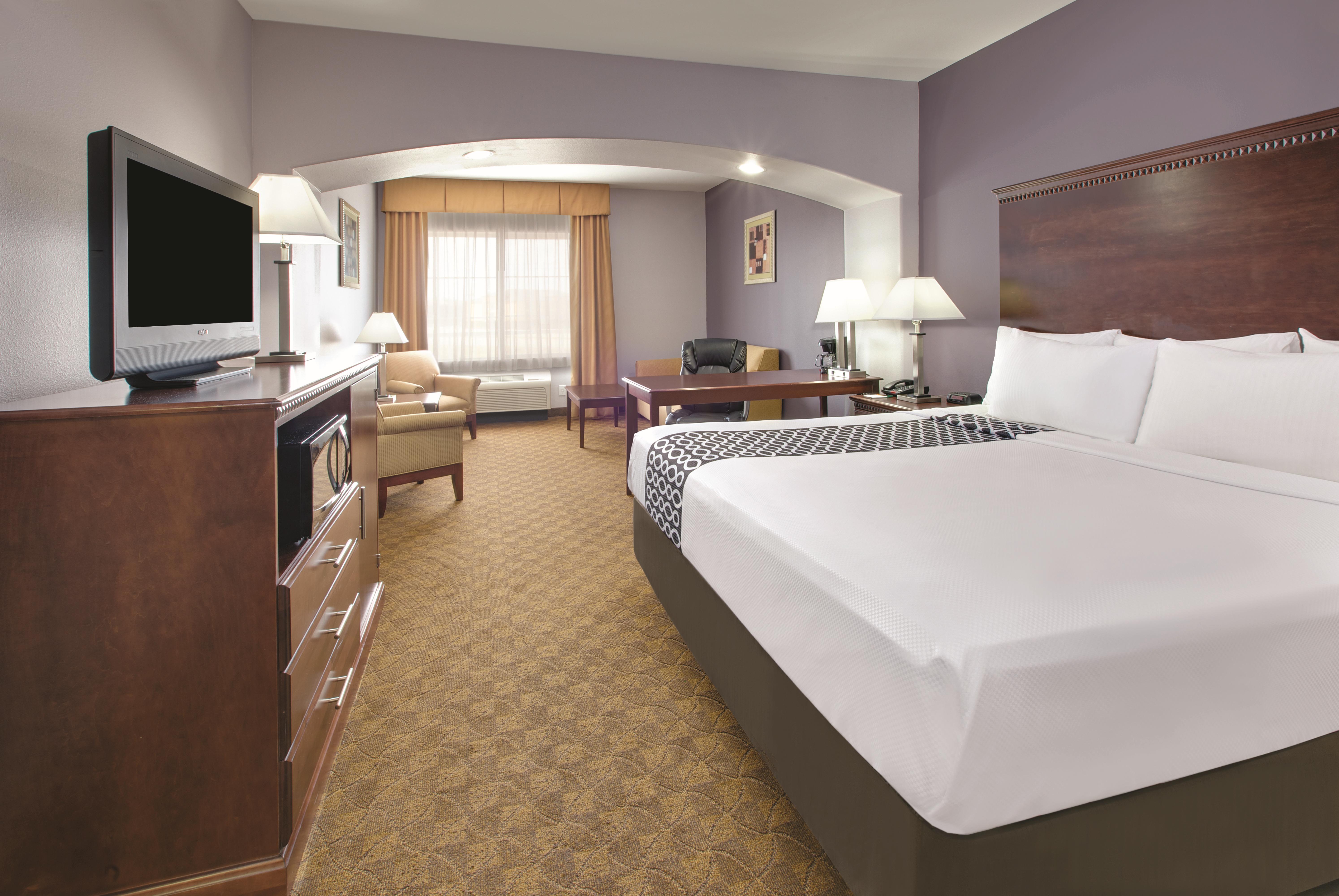 Guest room at the La Quinta Inn & Suites by Wyndham Corsicana in Corsicana, Texas