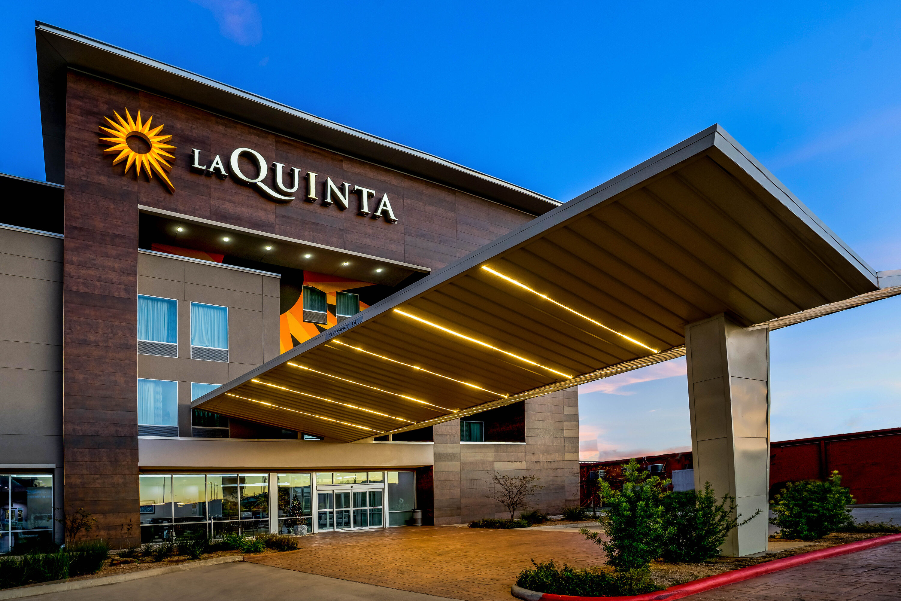 Exterior Dusk Image of La Quinta Inn & Suites by Wyndham Houston Cypress hotel in Cypress, Texas