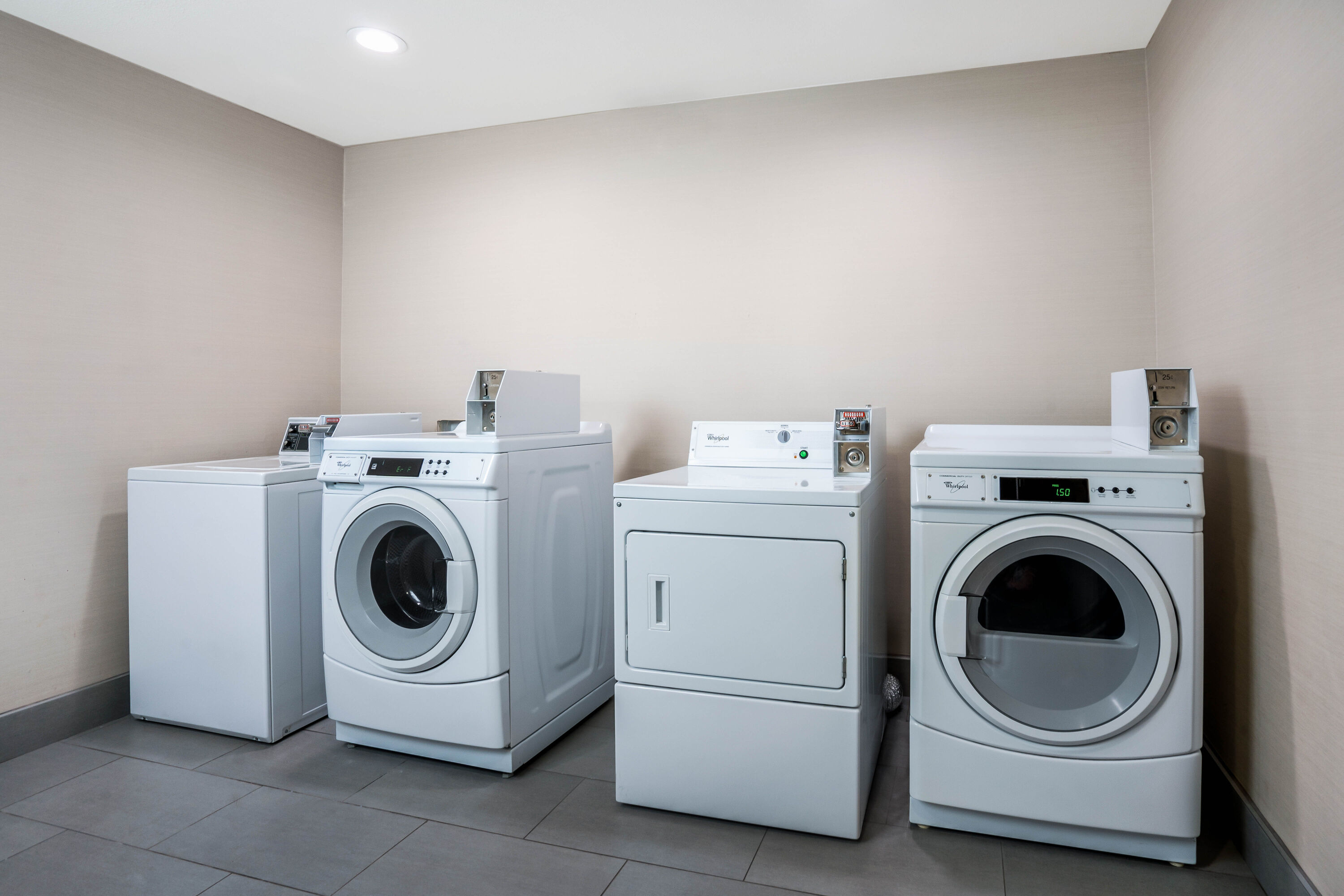 Laundry facilities at La Quinta Inn & Suites by Wyndham Houston Cypress in Cypress, Texas