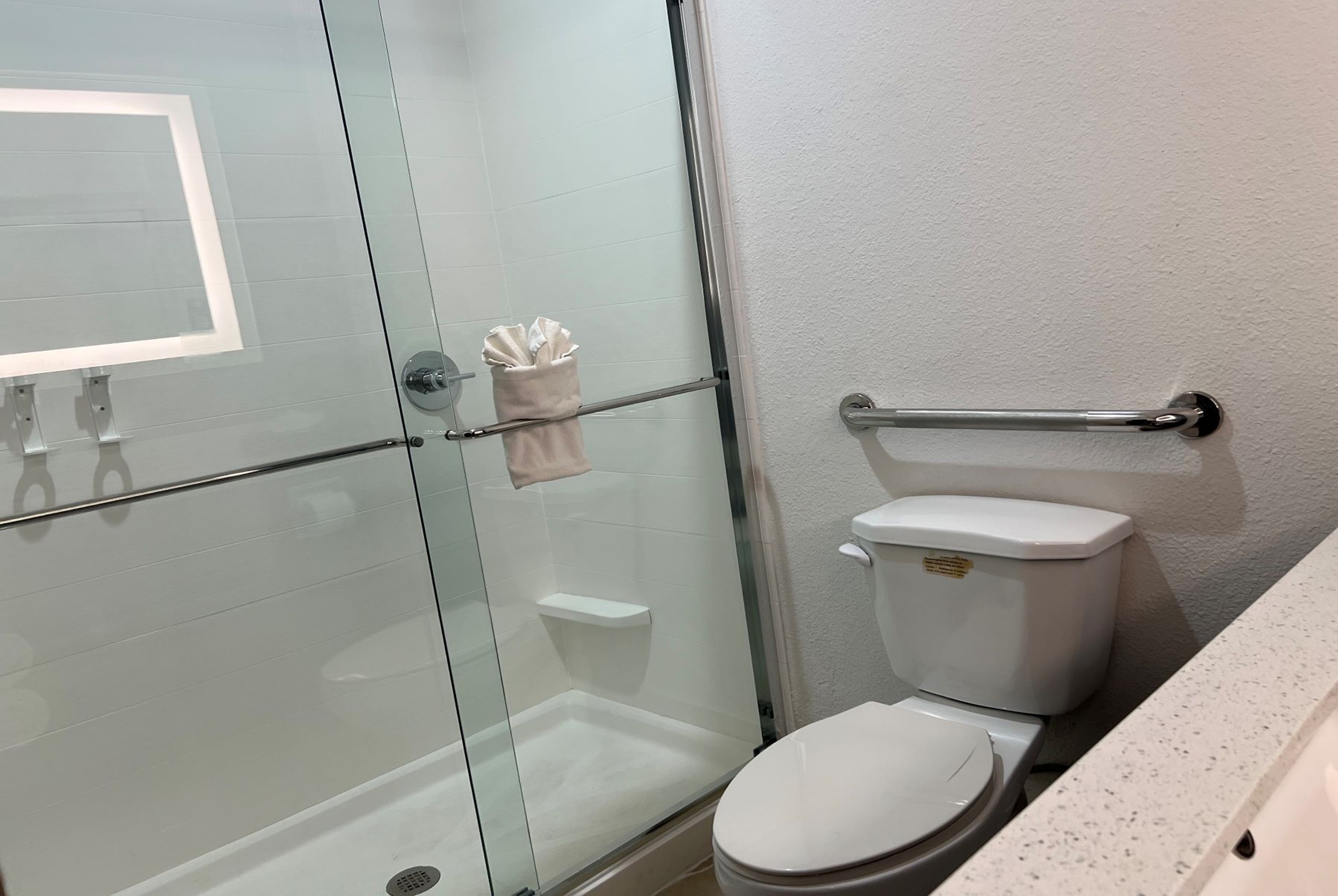Guest room bath at the La Quinta Inn & Suites by Wyndham Dalhart in Dalhart, Texas